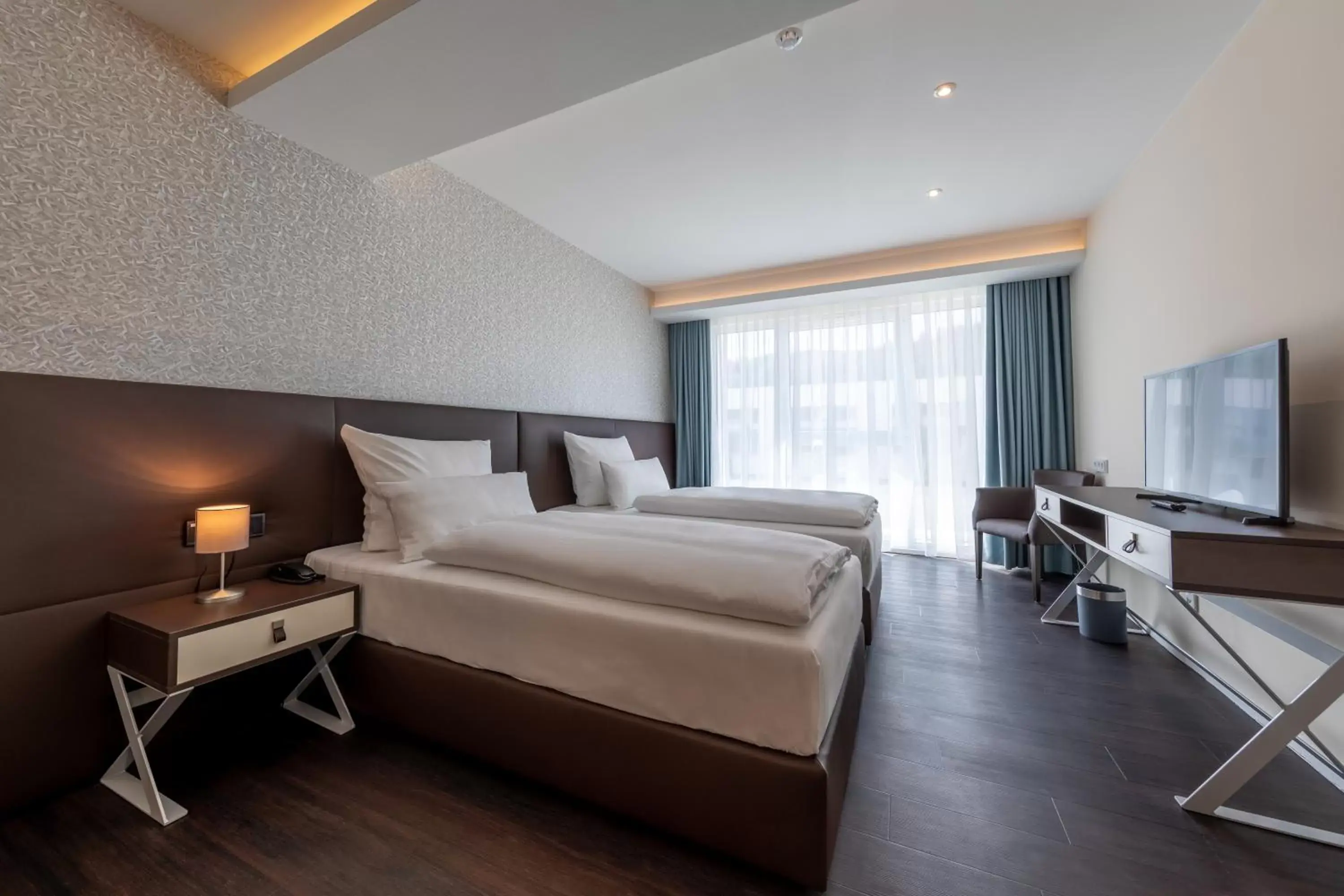 Bedroom in Trip Inn Conference Hotel & Suites