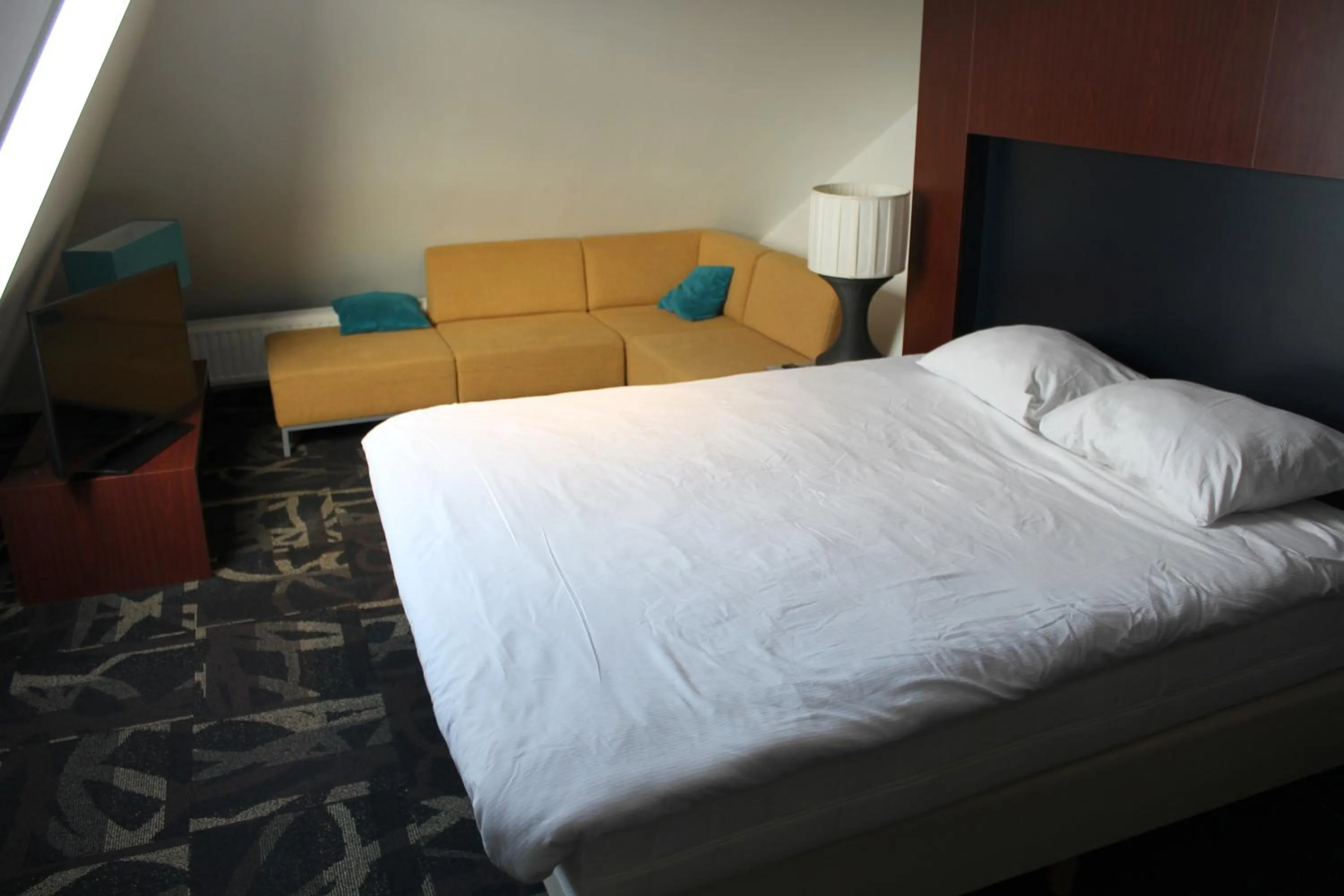 Bed in Fletcher Stadshotel Den Haag