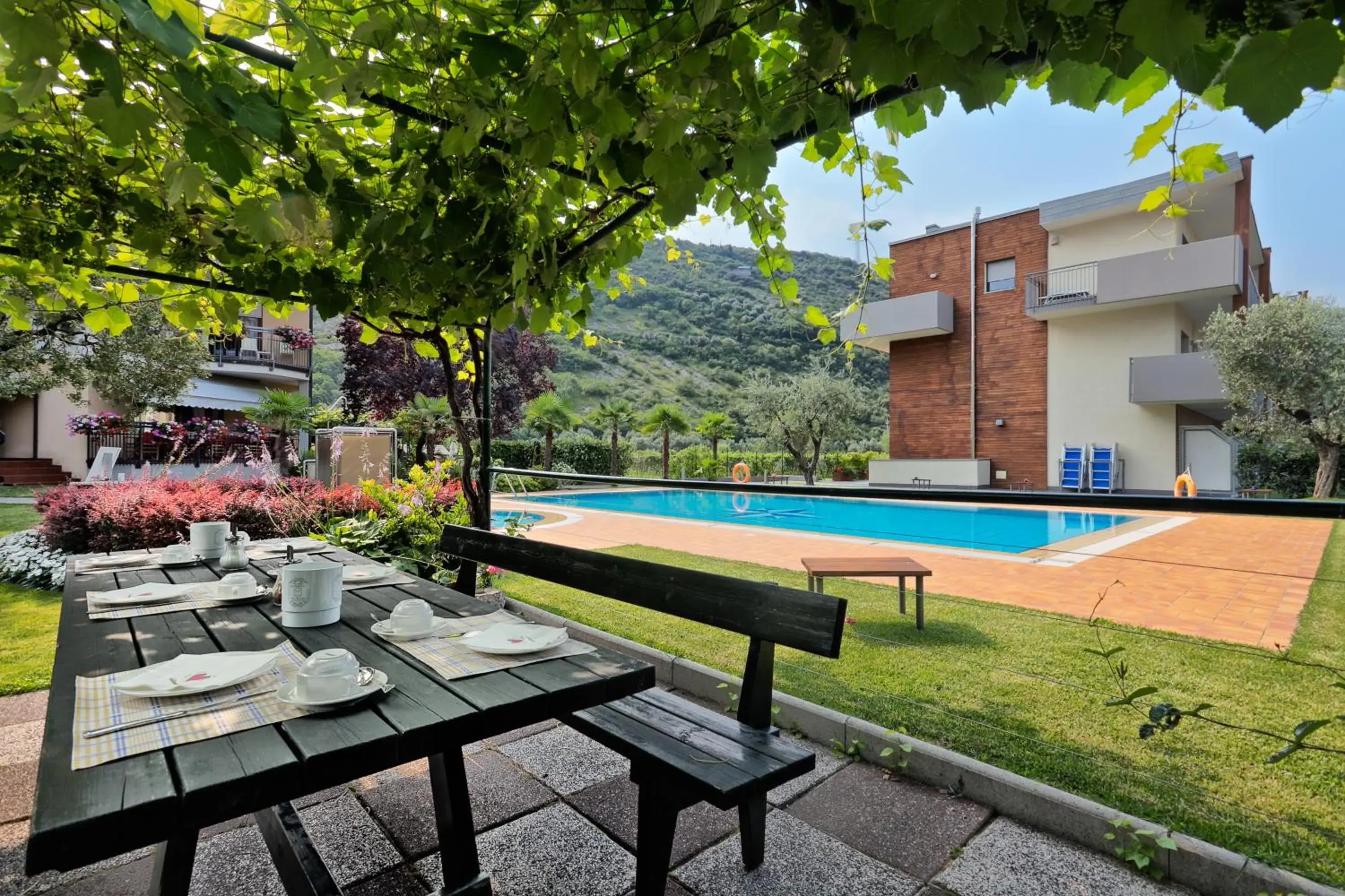 Garden, Swimming Pool in Sporthotel Villa Stella