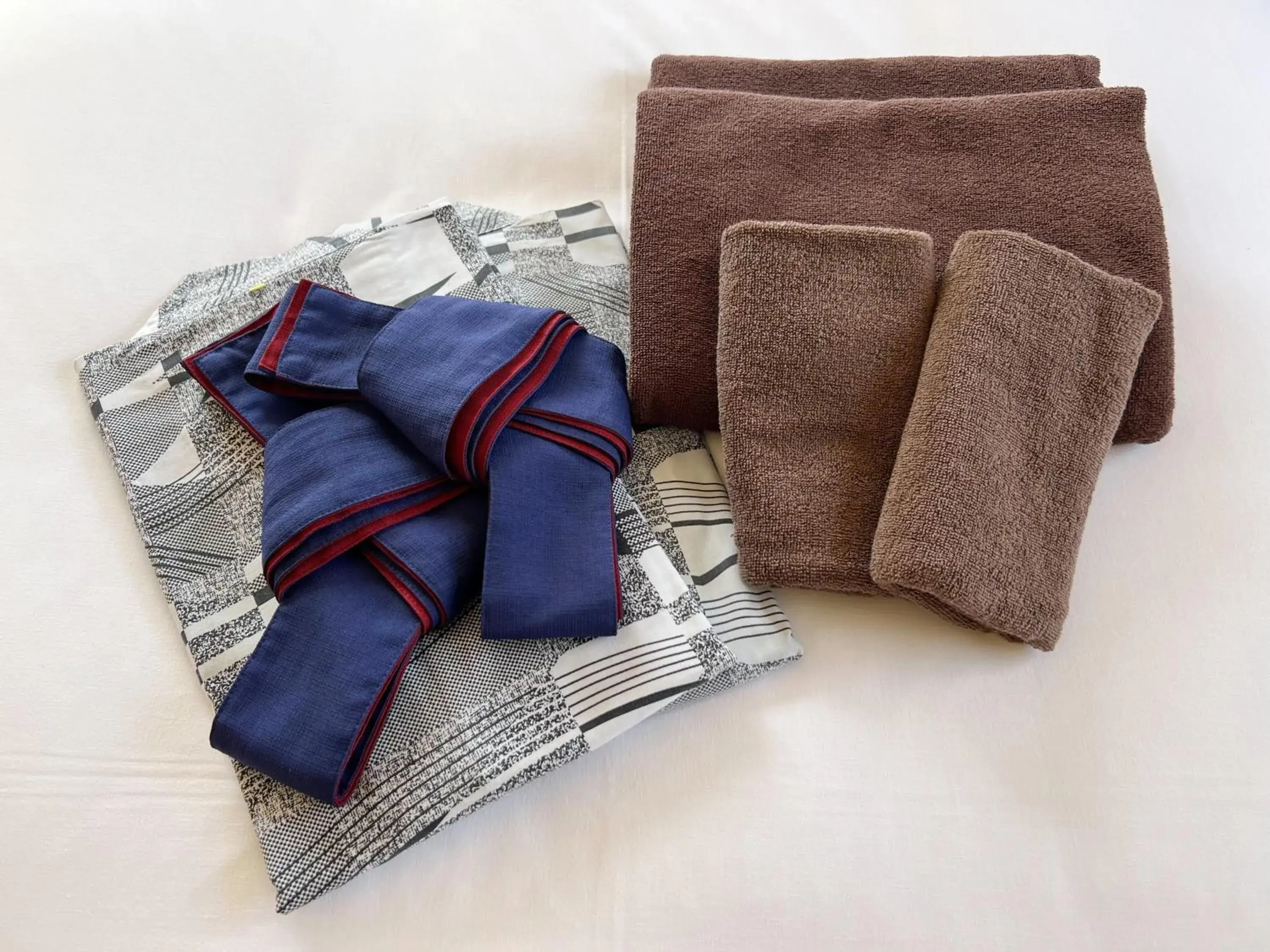 towels, Bed in Hotel Sasarindou