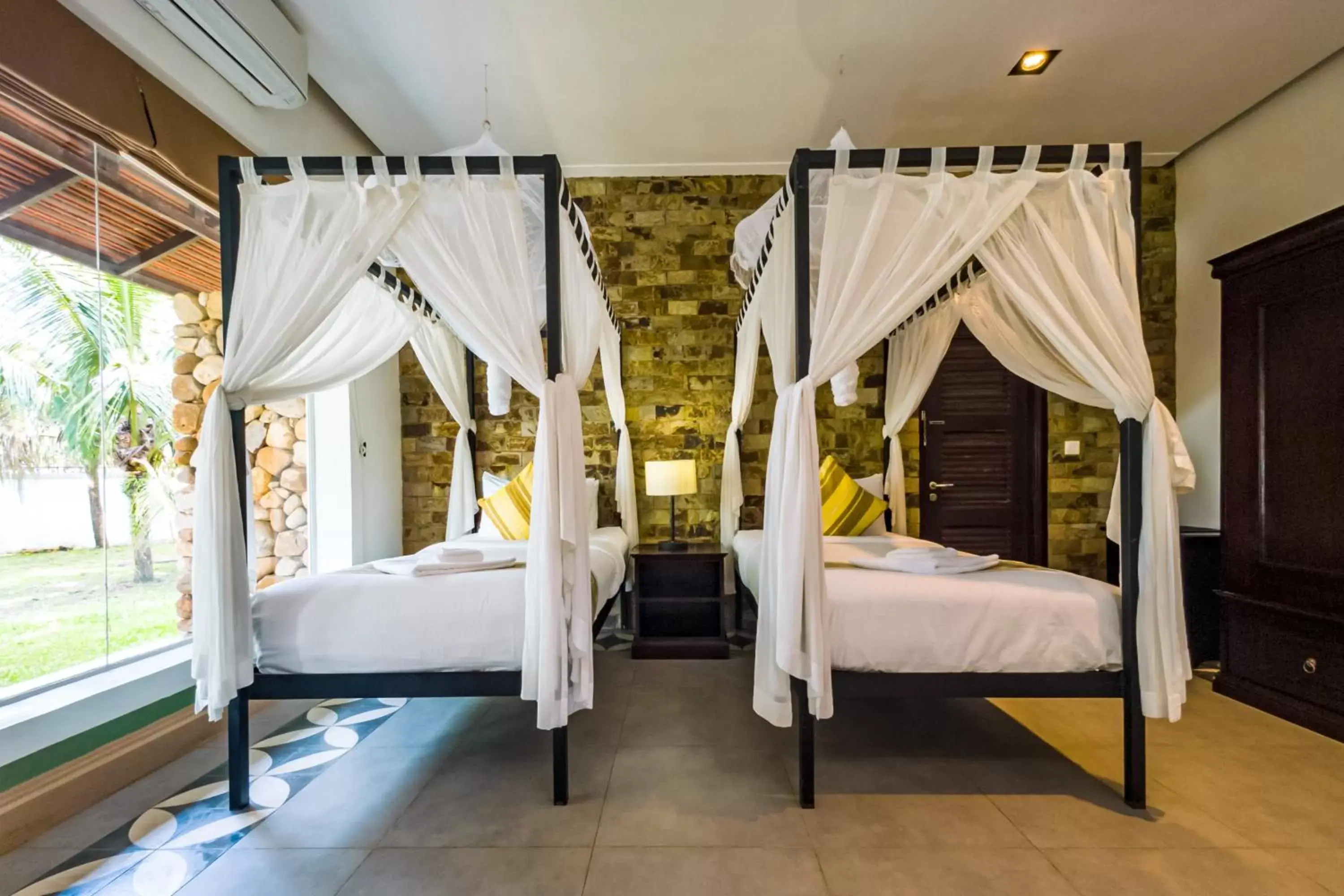 Bed in Samanea Beach Resort & Spa