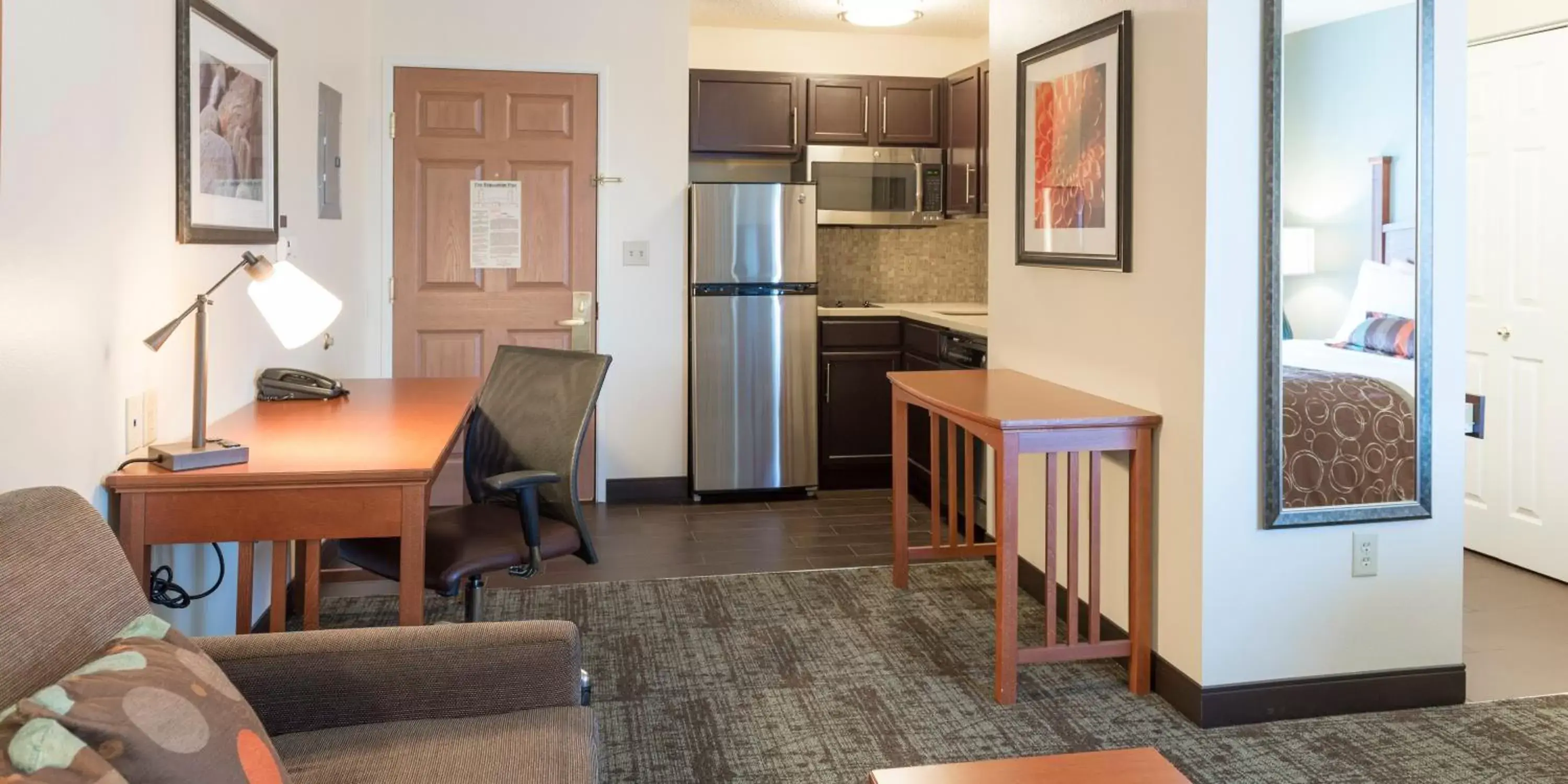 Photo of the whole room, Kitchen/Kitchenette in Staybridge Suites Fargo, an IHG Hotel