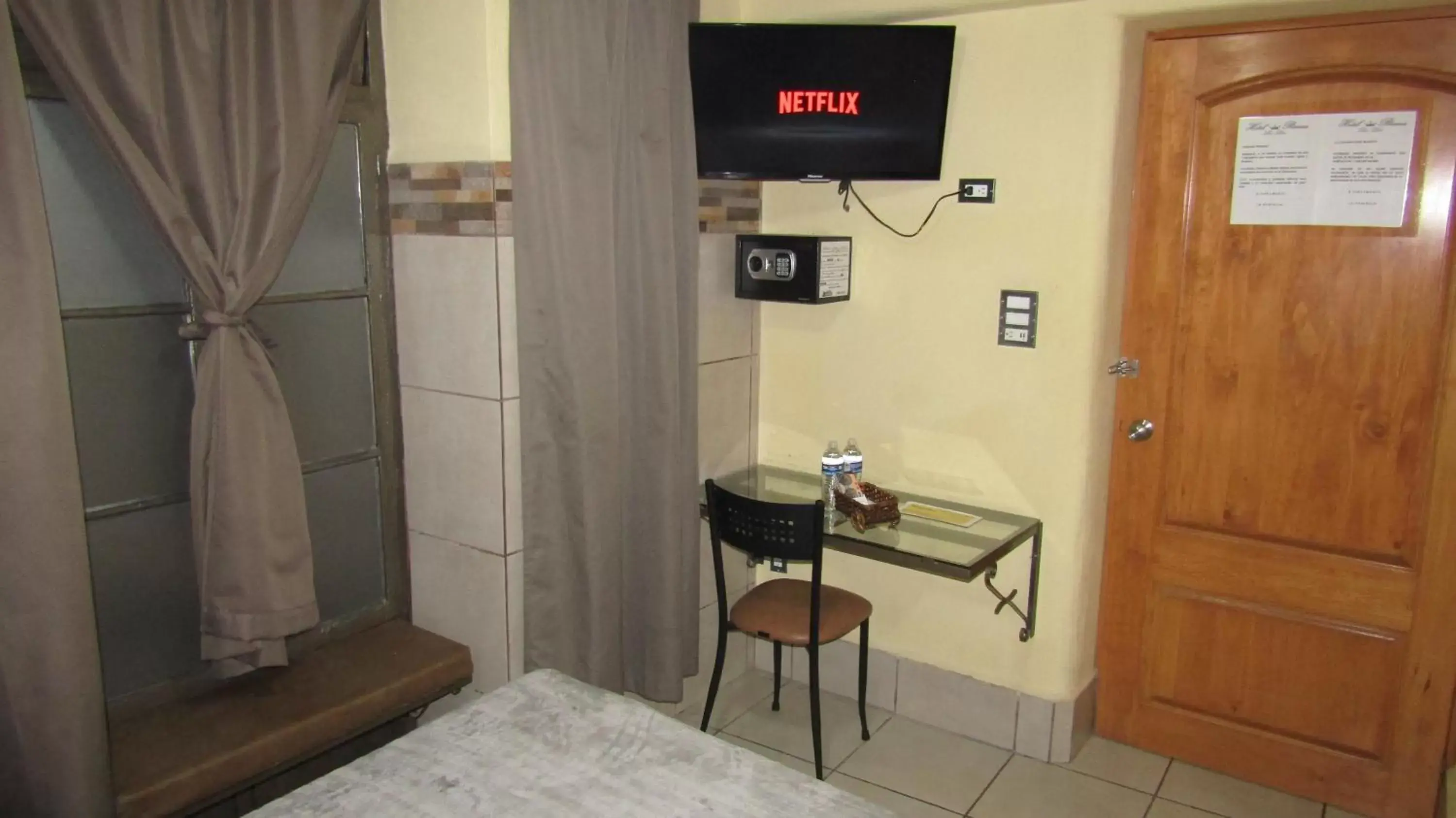 TV and multimedia, TV/Entertainment Center in Ruma San Luis Hotel Boutique