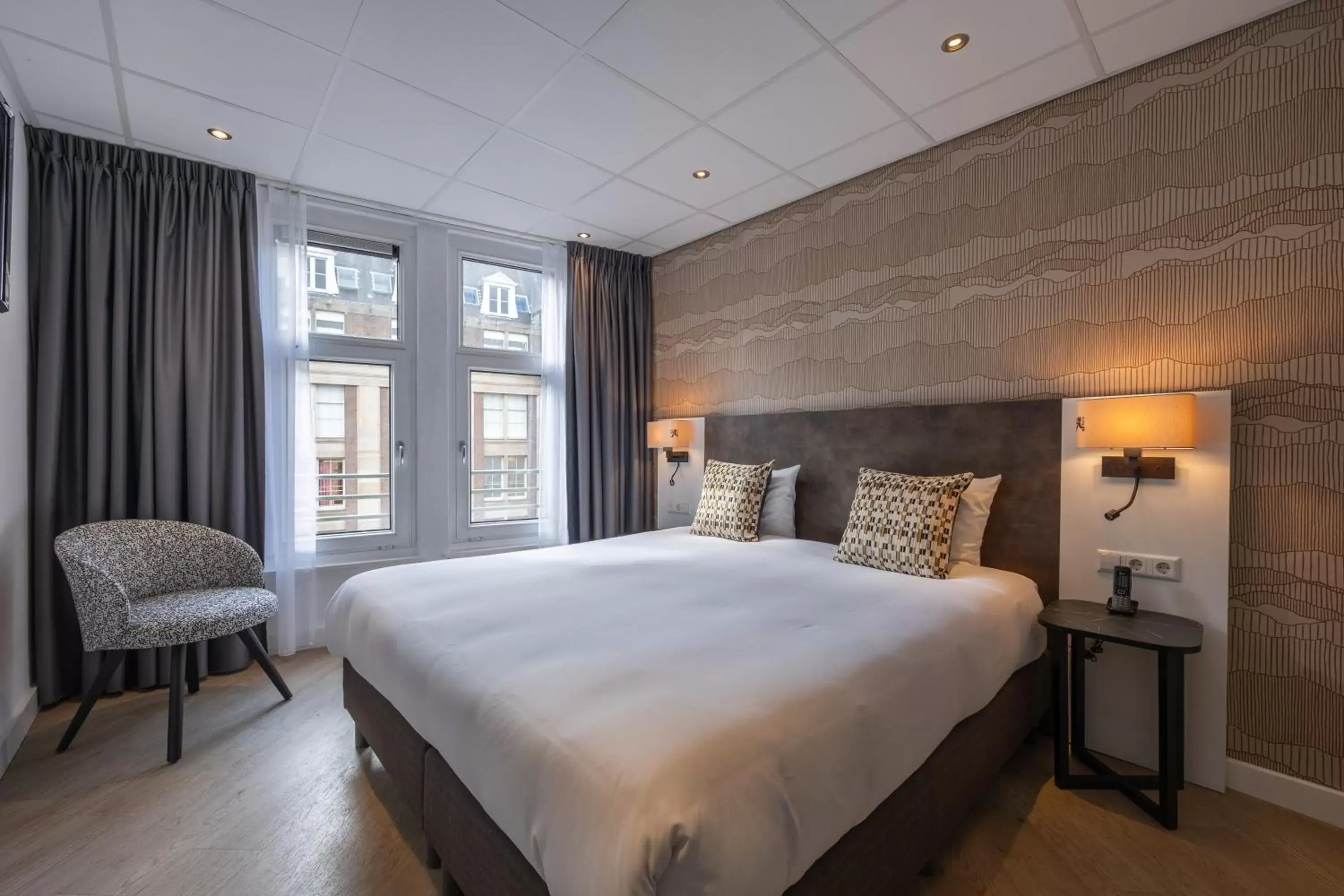 Bed in Hotel Amsterdam De Roode Leeuw