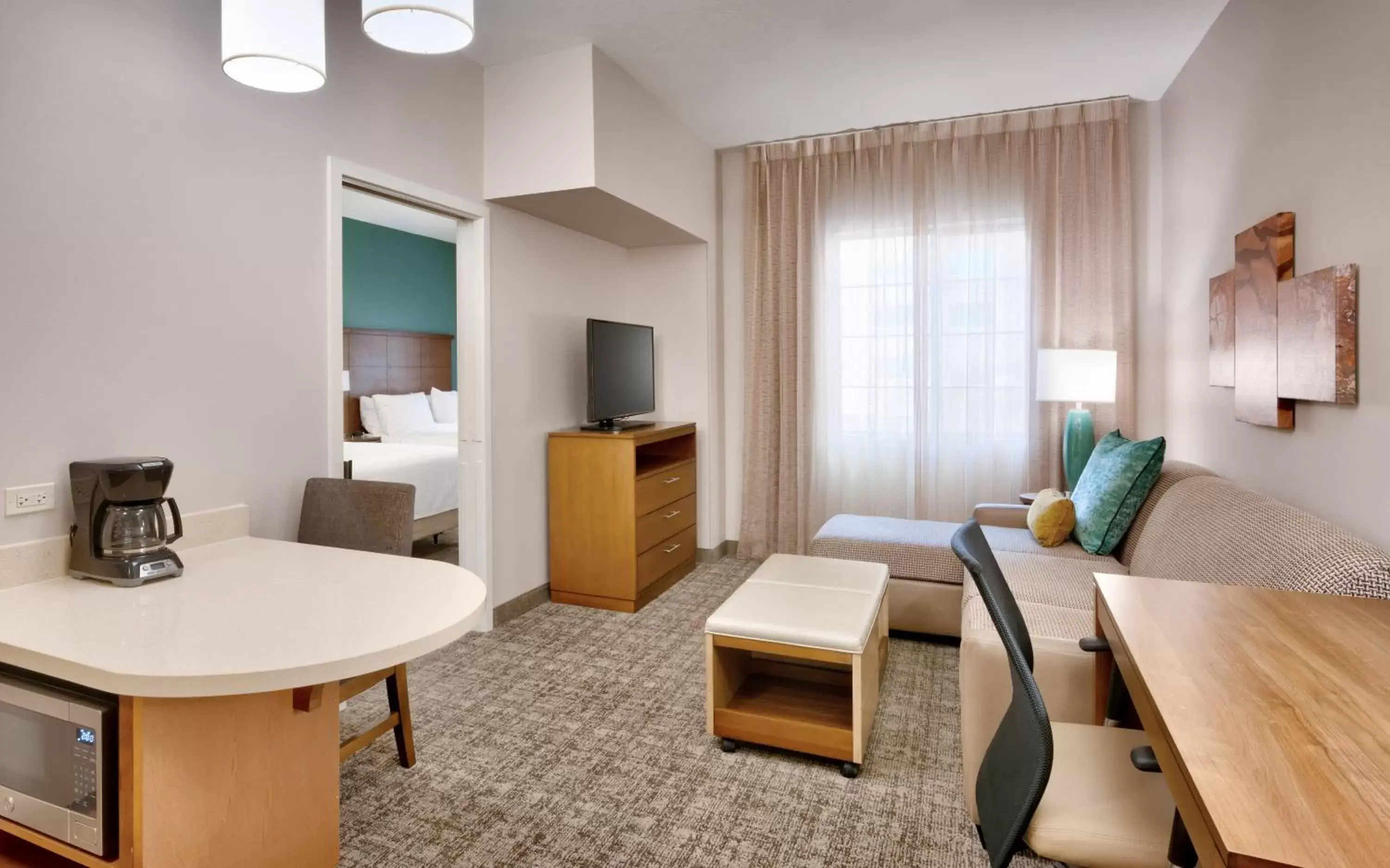 Photo of the whole room, Seating Area in Staybridge Suites - Gainesville I-75, an IHG Hotel