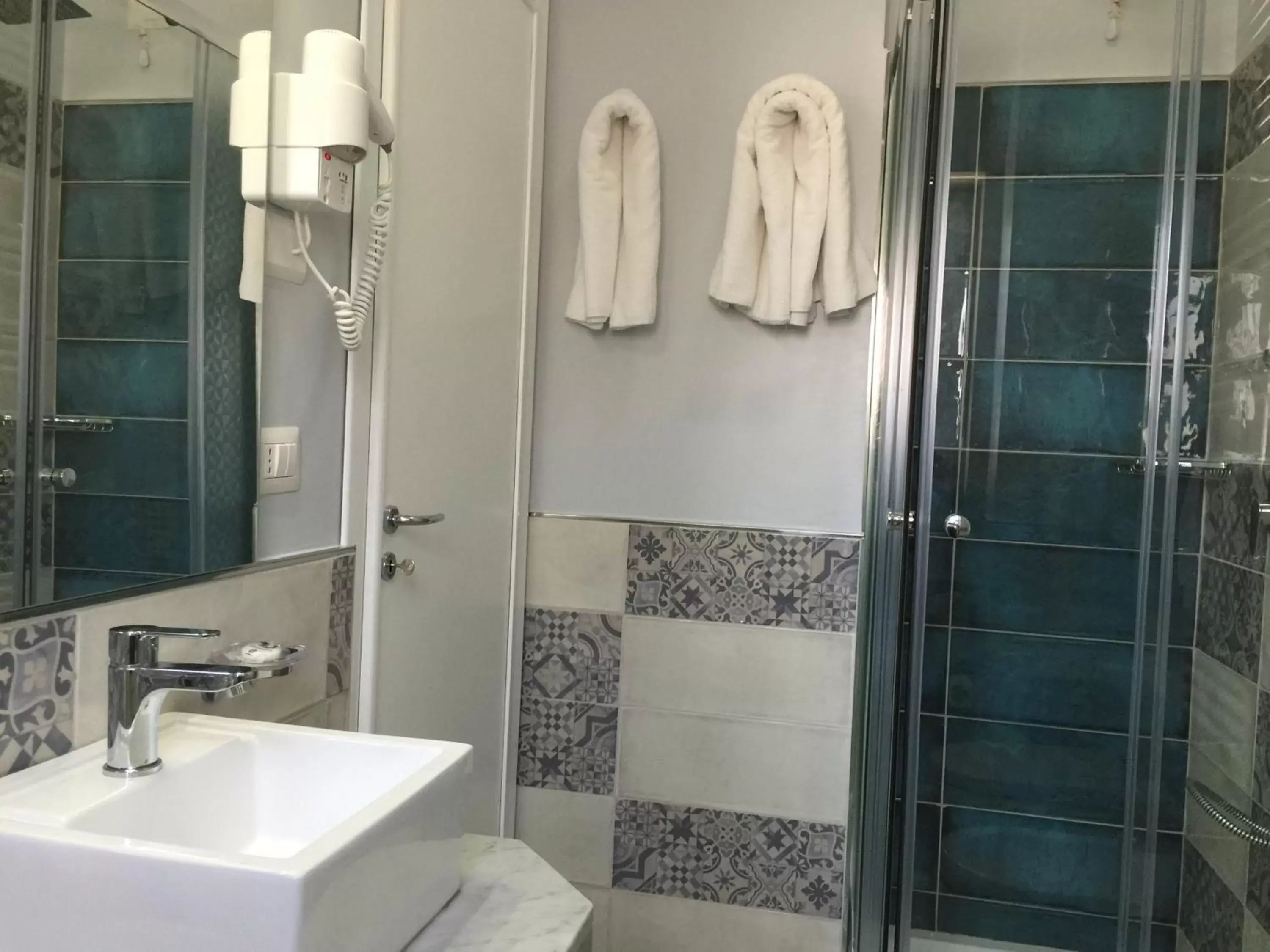 Bathroom in Hotel Costazzurra Museum & Spa Bathroom in Hotel Costazzurra Museum & Spa