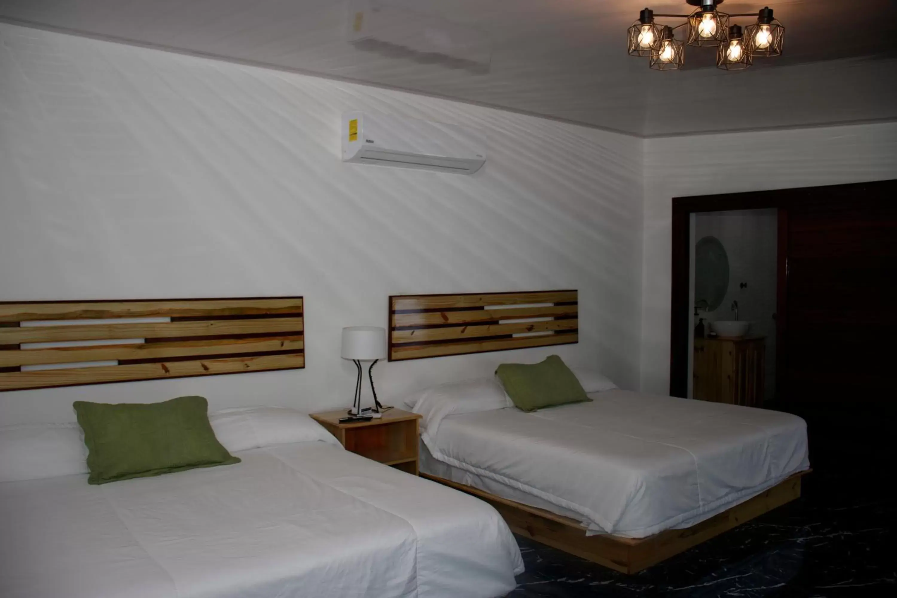 Photo of the whole room, Bed in Hotel Samoa del Sur