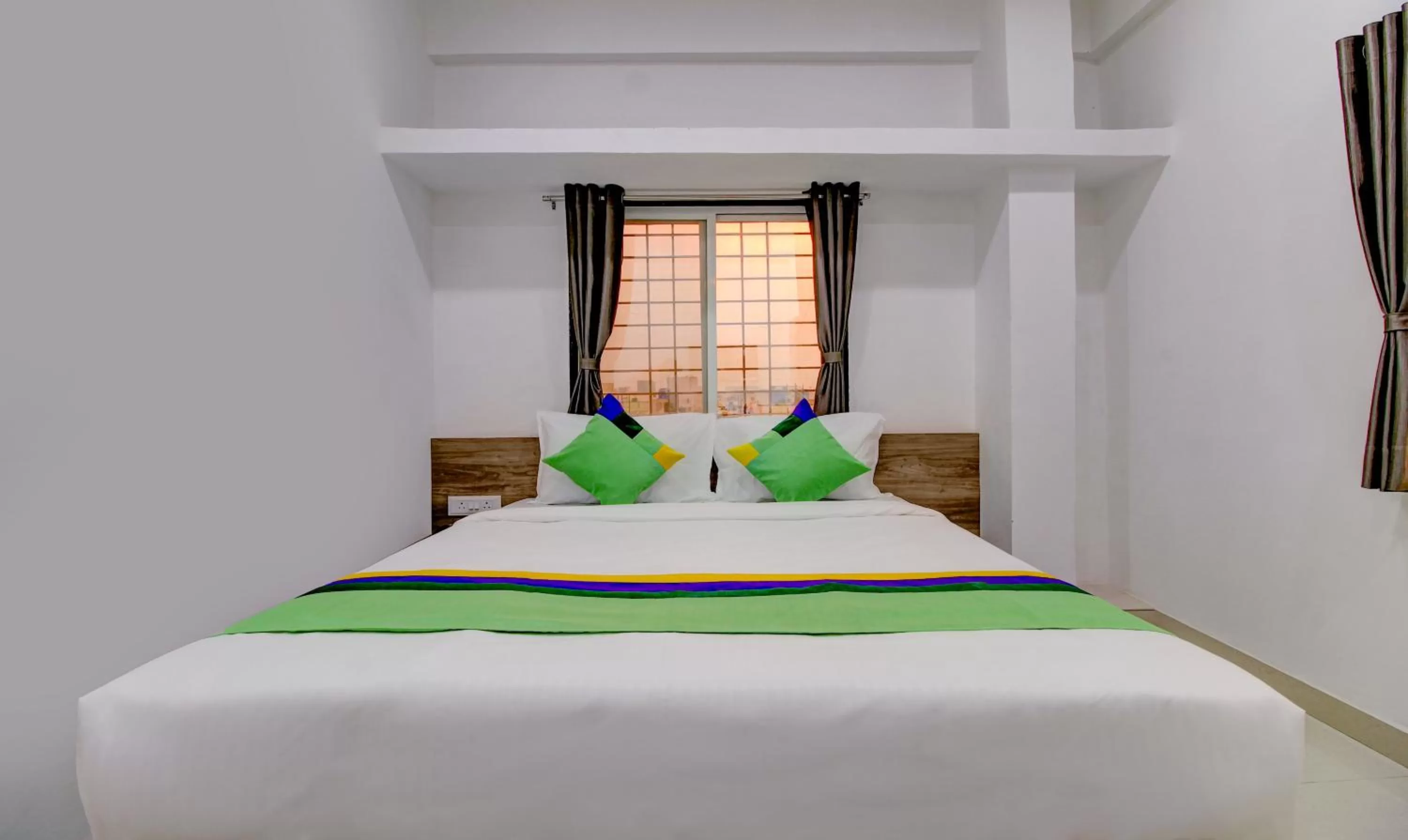 Bed in Treebo Trend White House