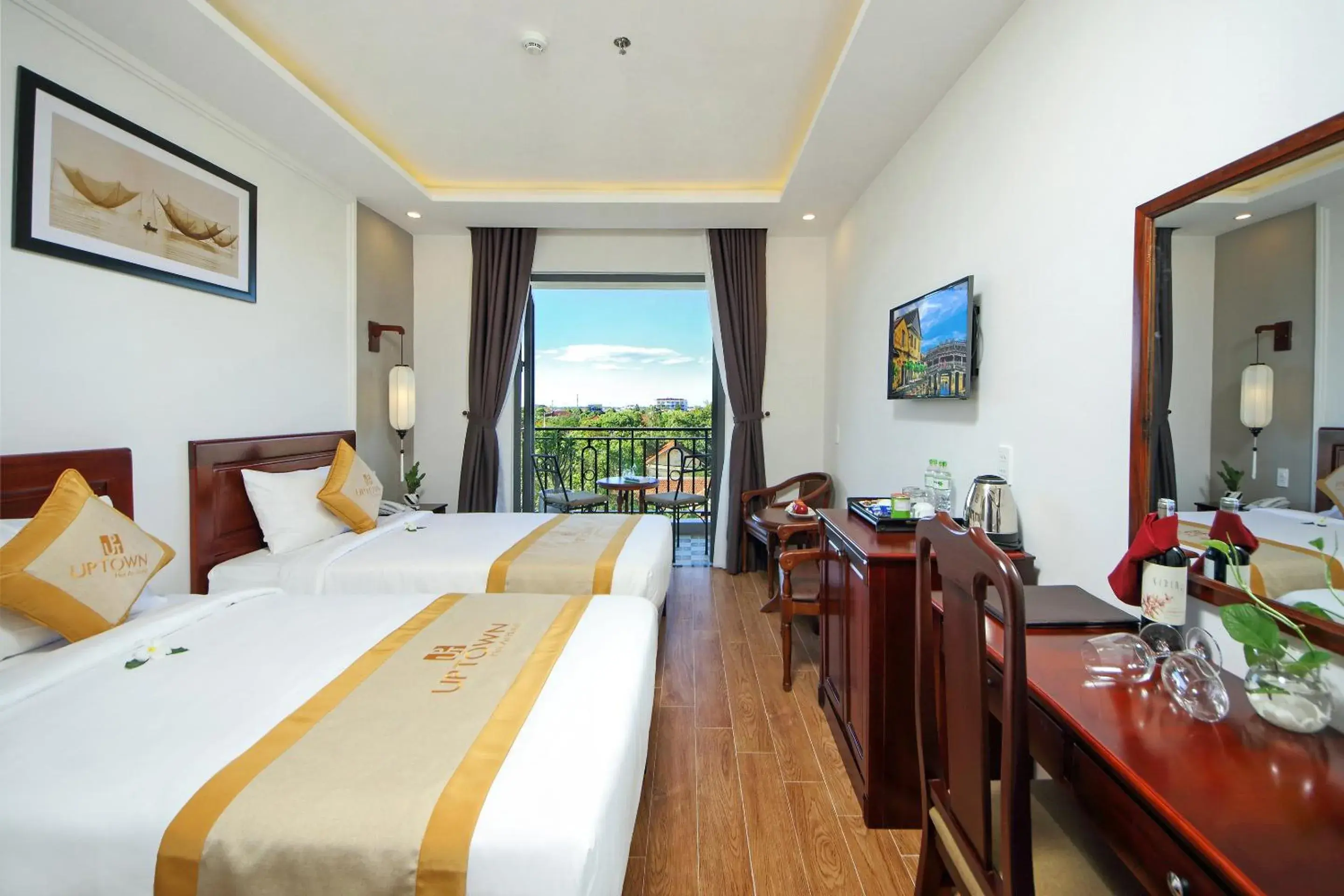 Photo of the whole room, Bed in Uptown Hoi An Hotel & Spa Photo of the whole room, Bed in Uptown Hoi An Hotel & Spa