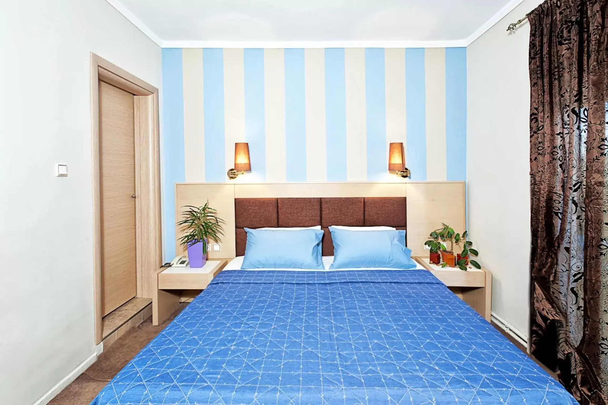 Bed in Anastassiou Hotel
