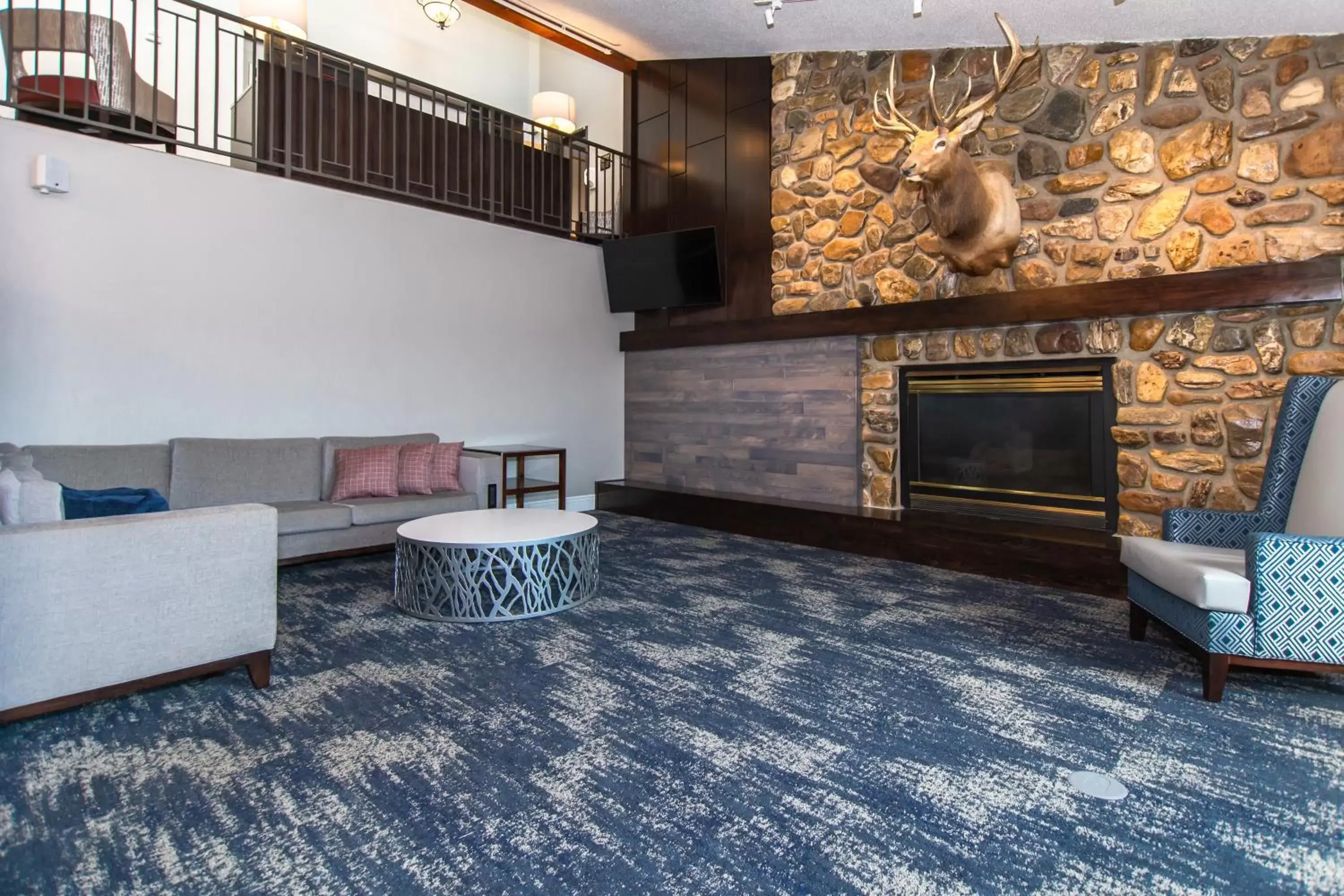 Living room, Seating Area in AmericInn by Wyndham Rapid City