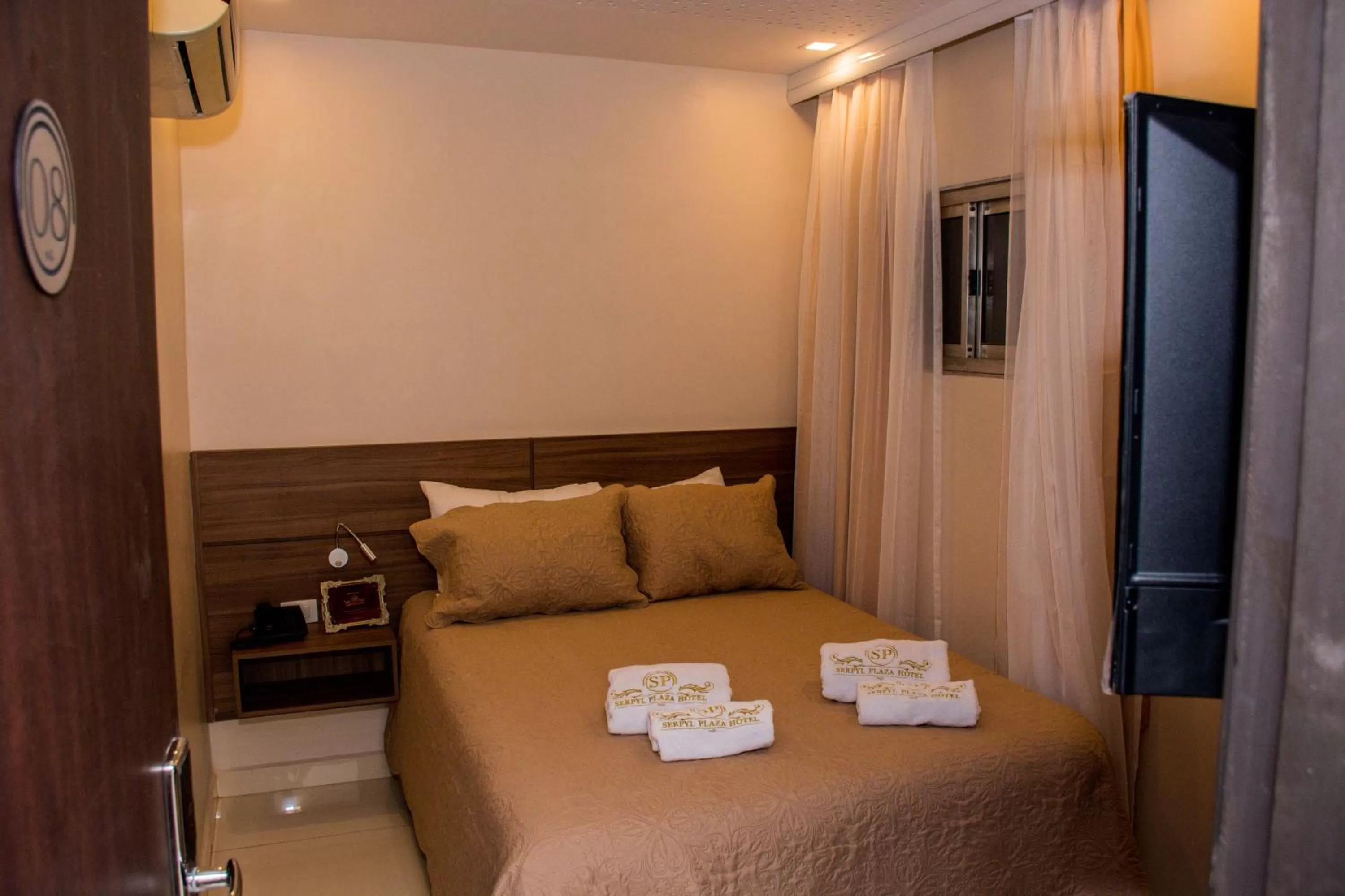 Bed in SERPYL Plaza Hotel