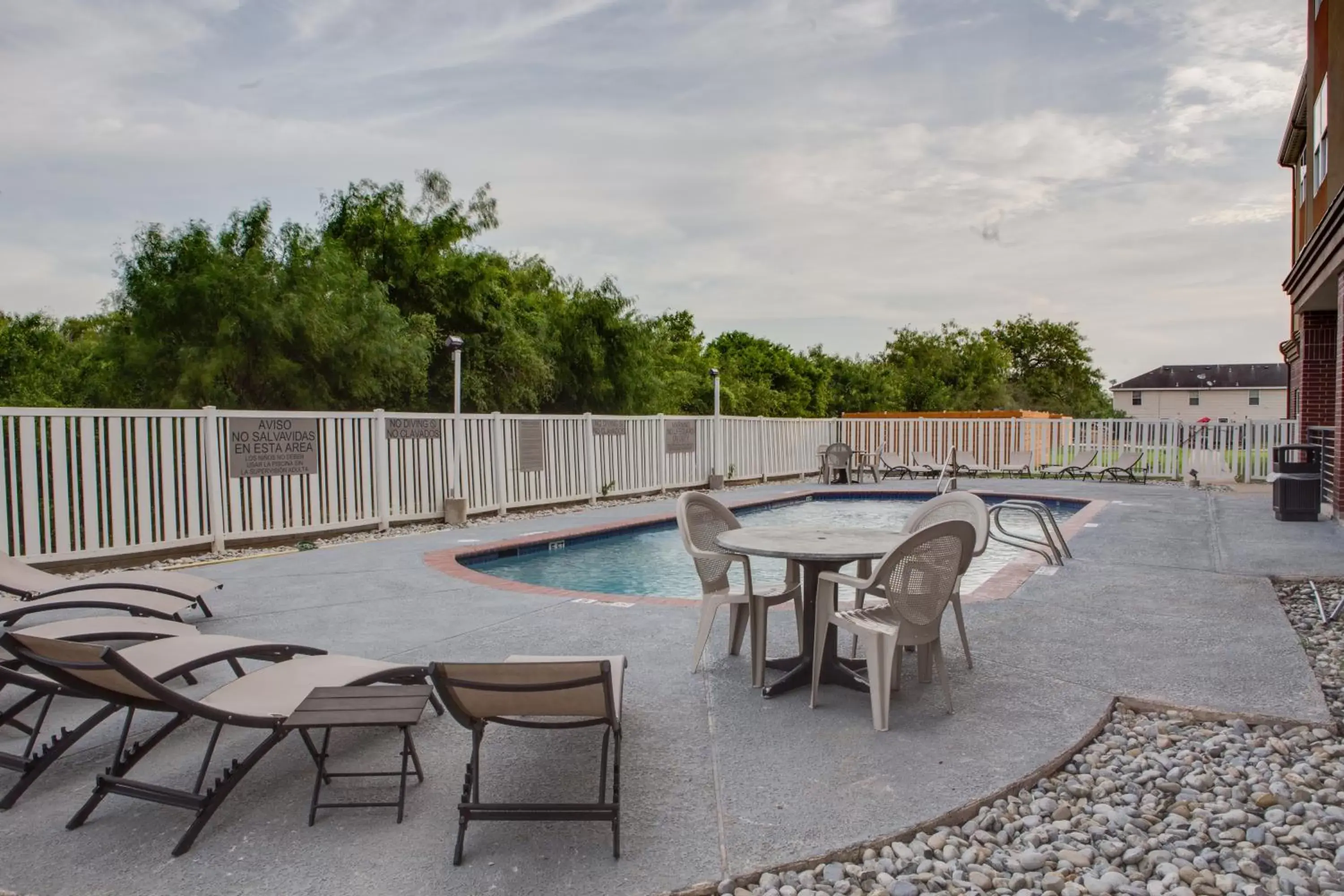 Balcony/Terrace, Swimming Pool in Country Inn & Suites by Radisson, Harlingen, TX