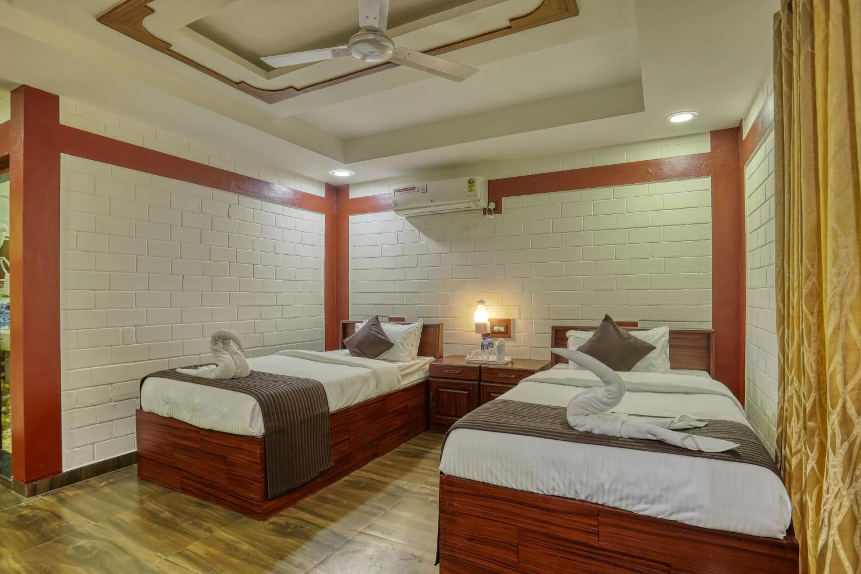 Bed in LEISURE VALLEY BEACH RESORT