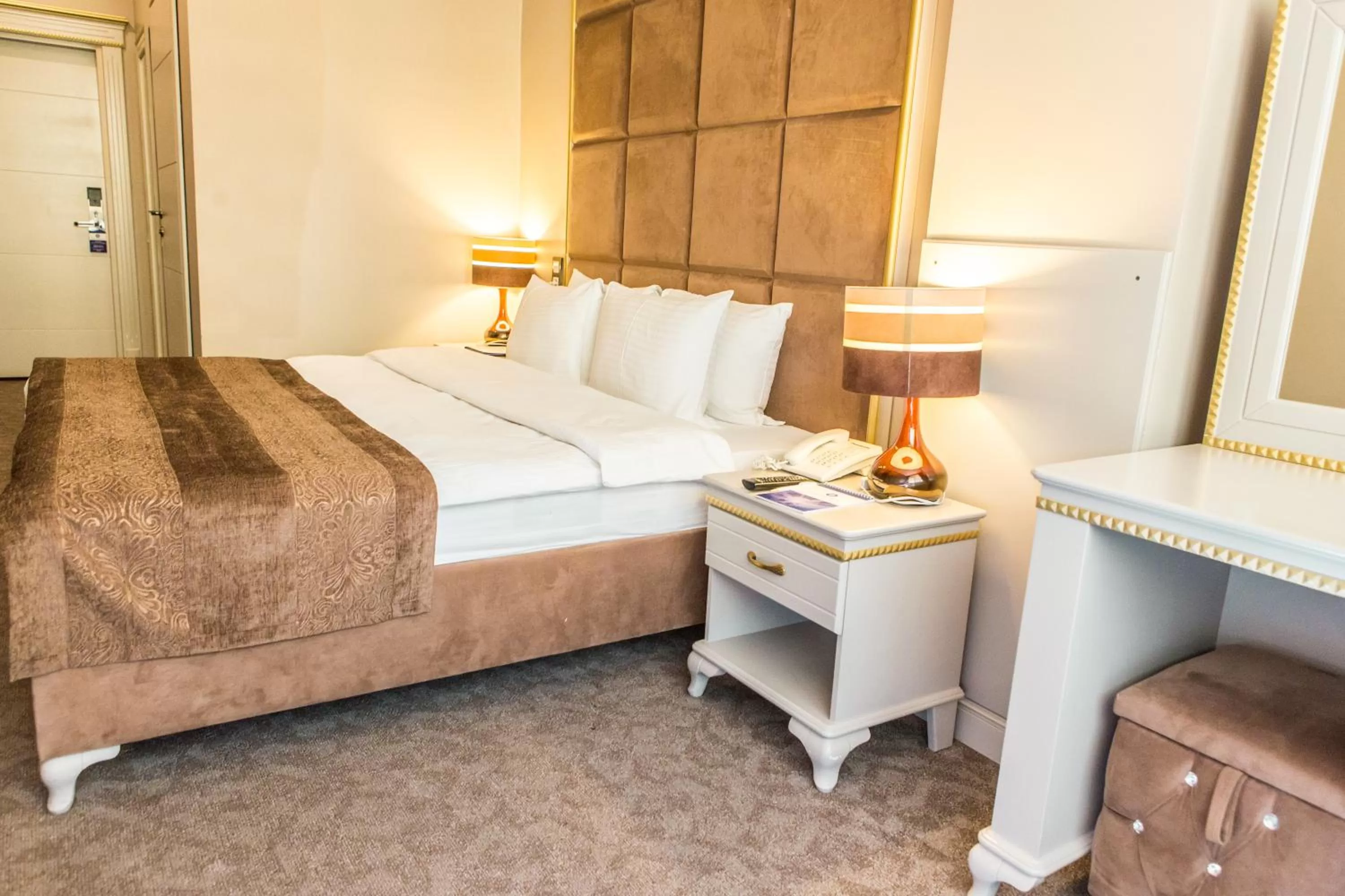 Bed in Grand Sapphire Hotel