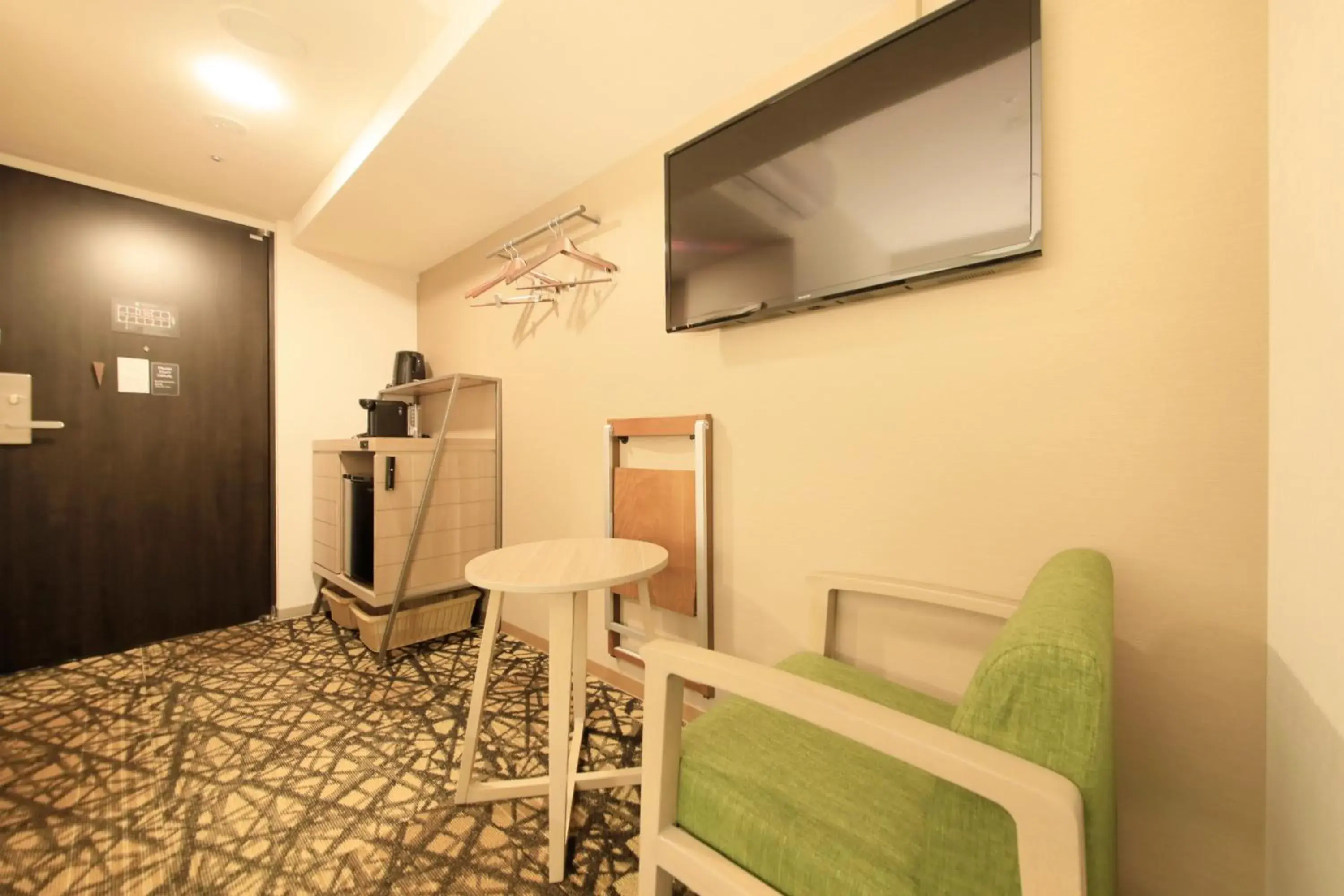 Photo of the whole room, TV/Entertainment Center in S-peria Inn Osaka Hommachi