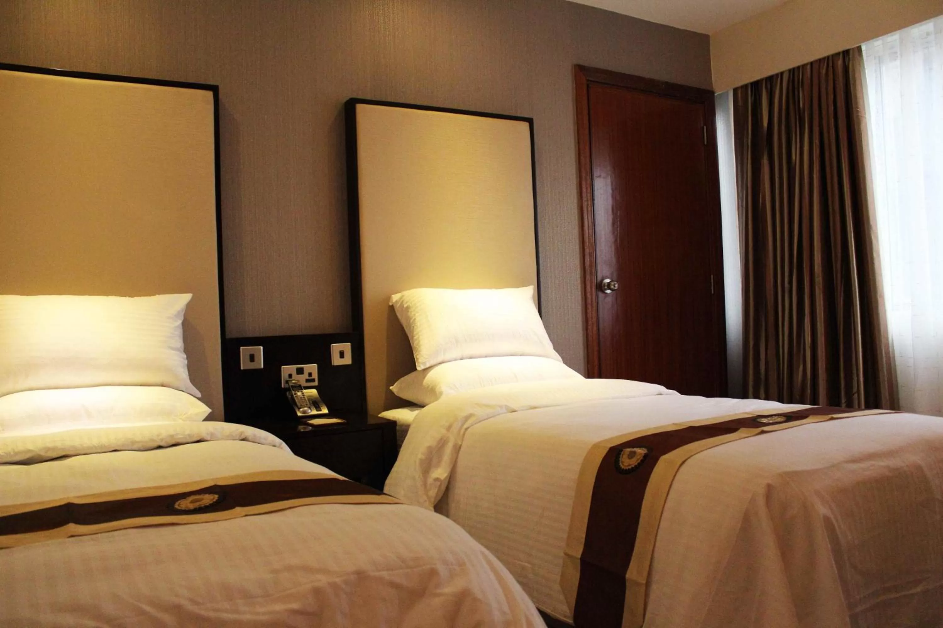 Bed in The Zehneria Hotel