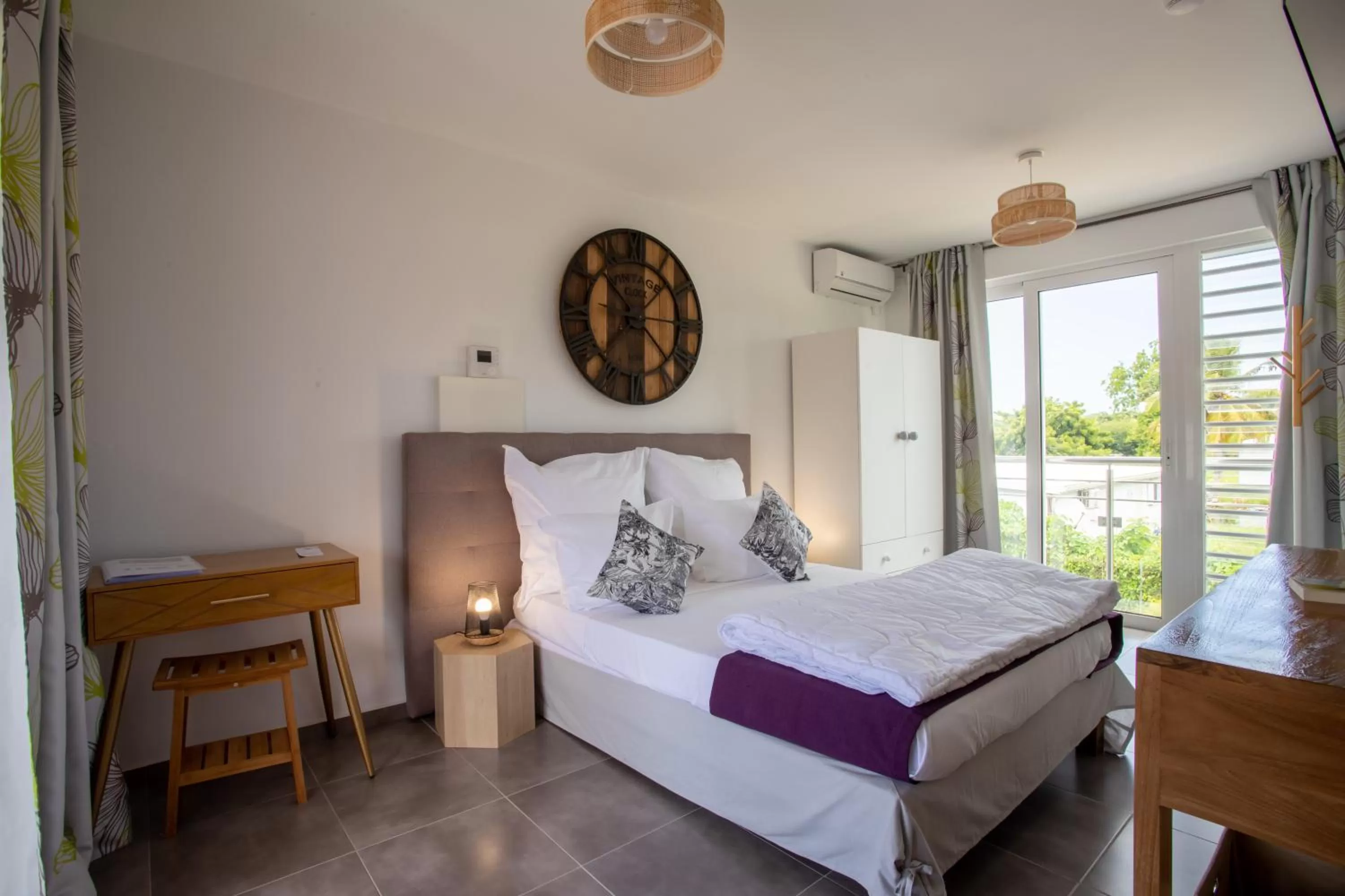 Bed in Hôtel Guadeloupe Palm Suites