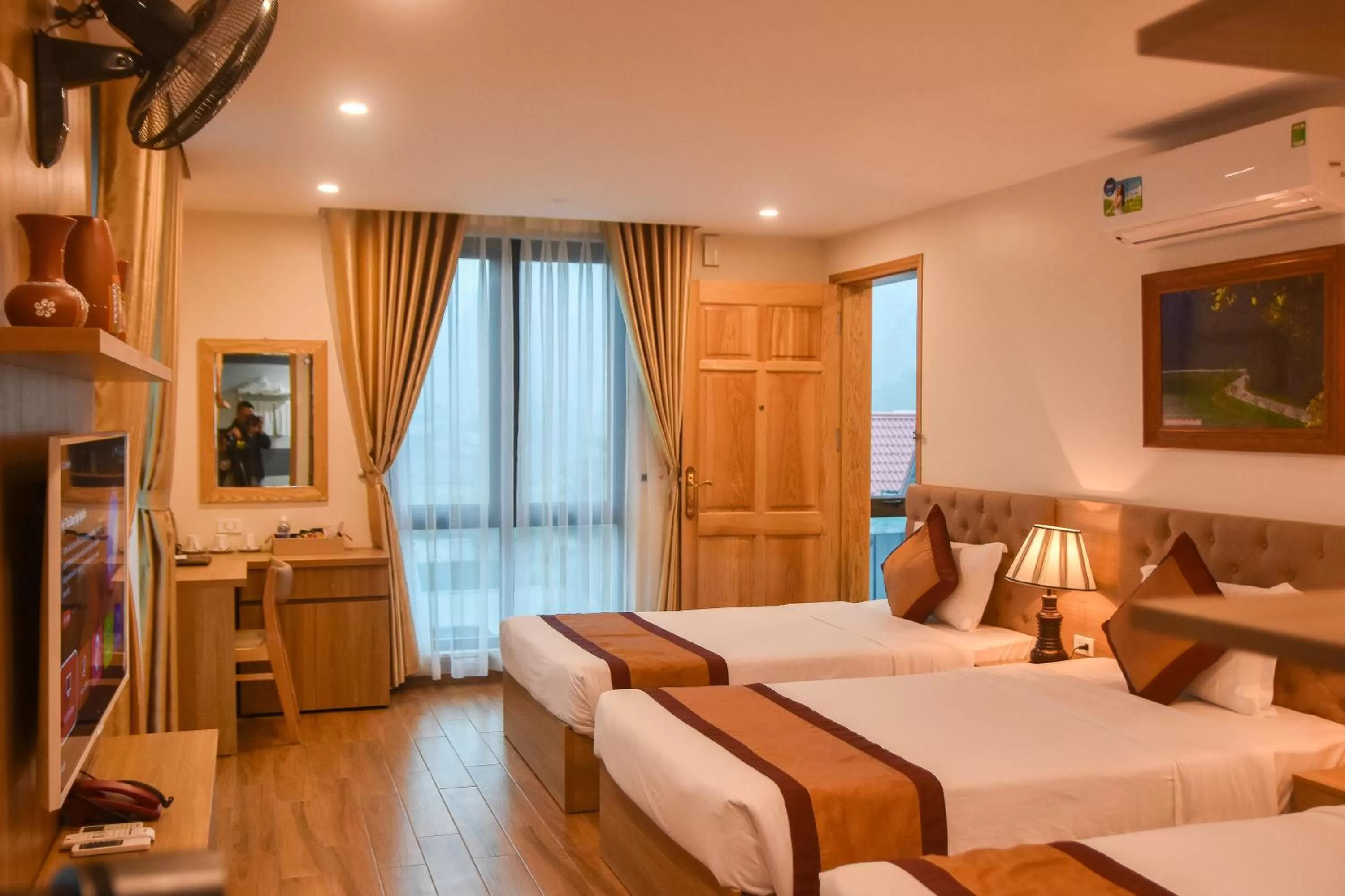 Bed in Cozynibi Hotel