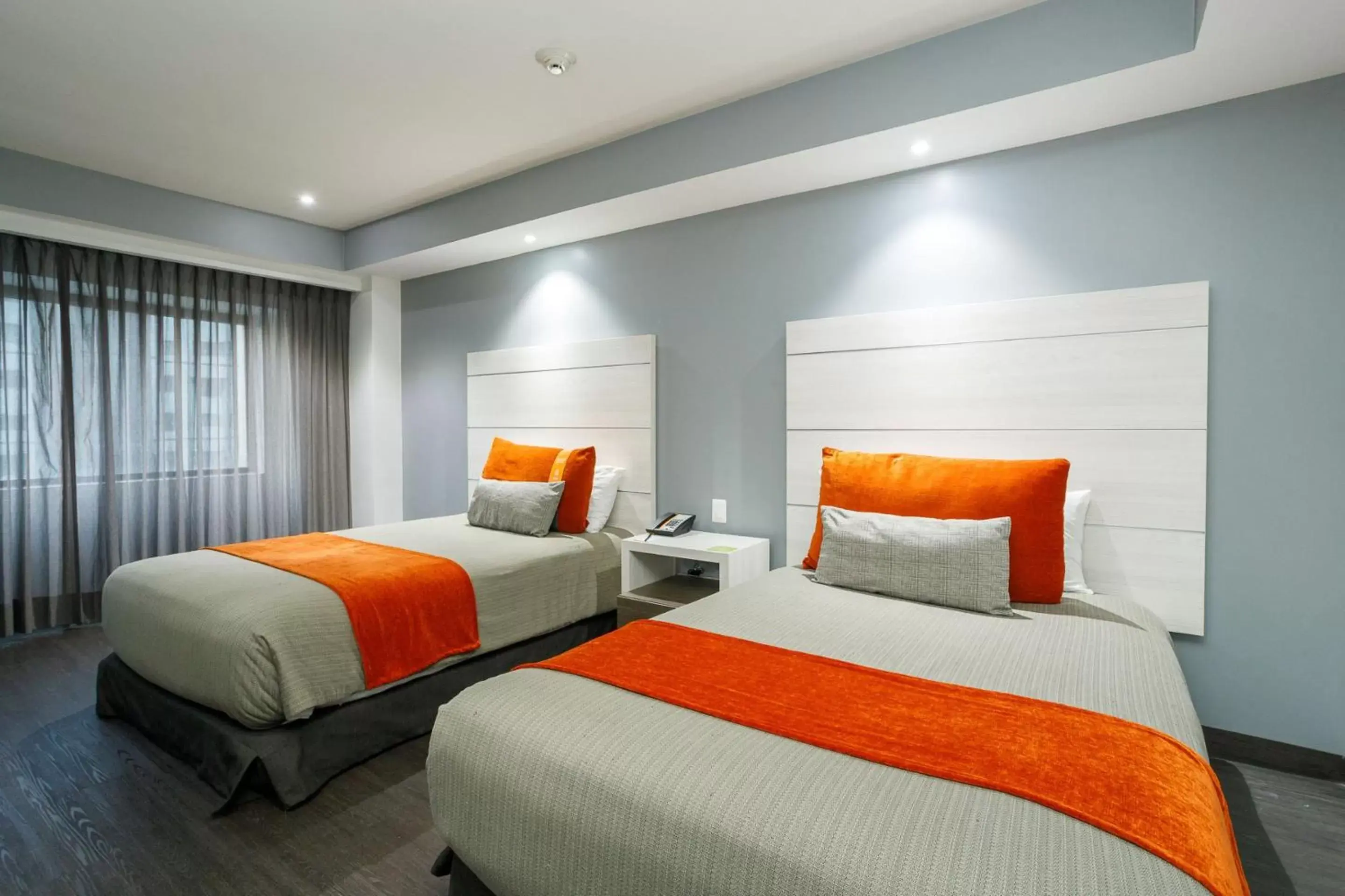 Photo of the whole room, Bed in Real Inn Tijuana by Camino Real Hotels