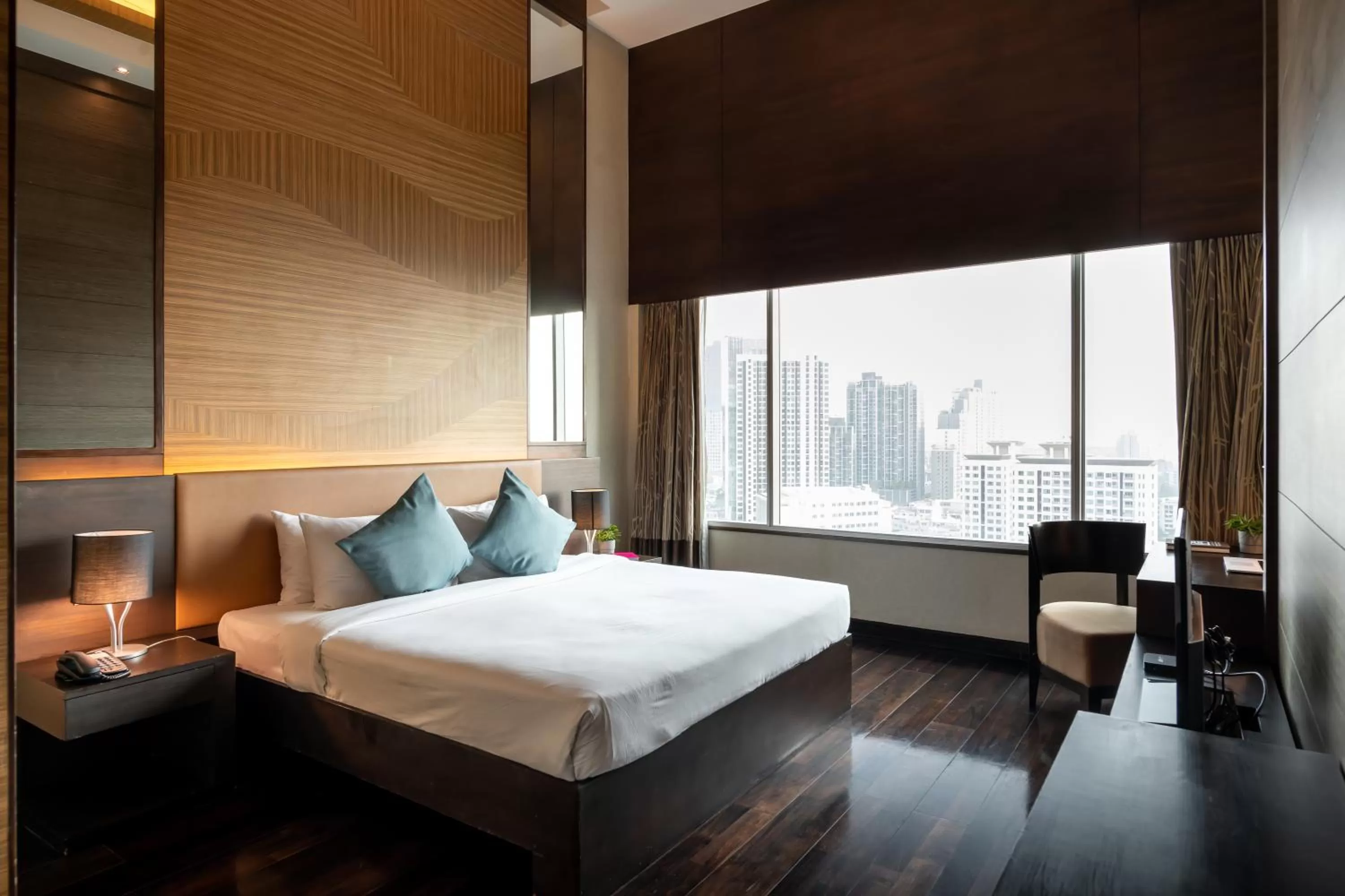 Bed in Jasmine Resort Bangkok