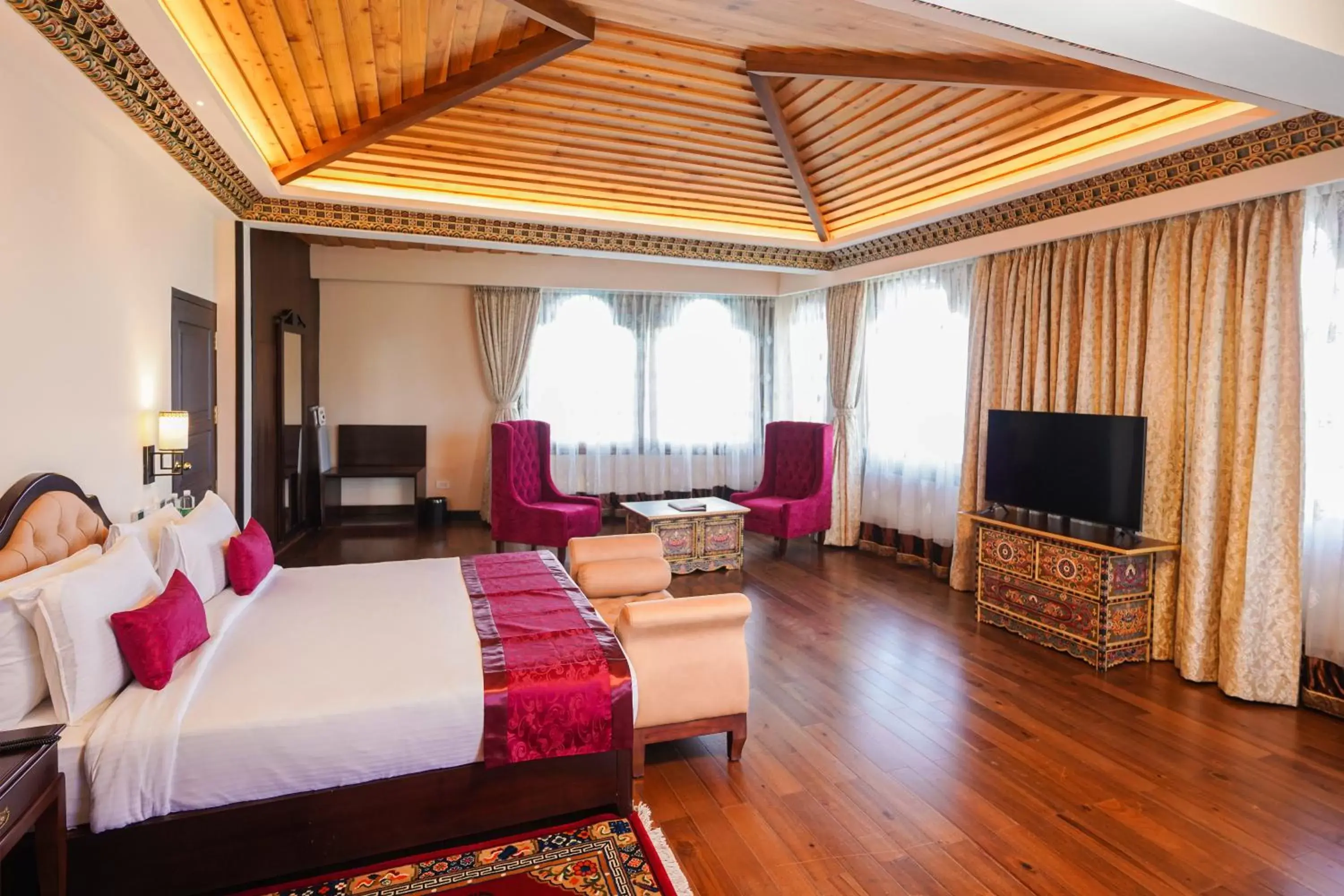 Bed, TV/Entertainment Center in Denzong Regency- Luxury Mountain Retreat Spa & Casino