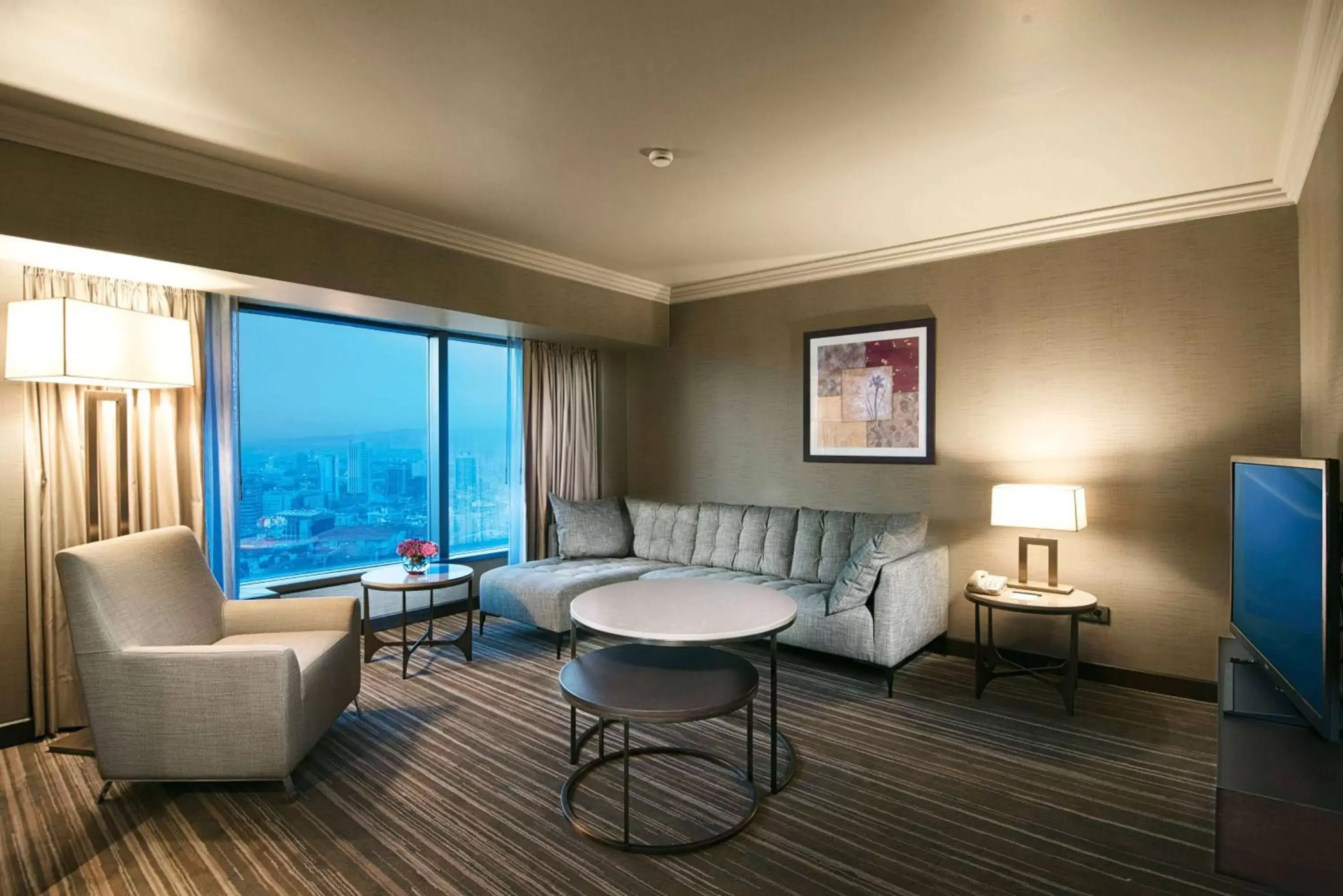 Bed, Seating Area in Ankara HiltonSA