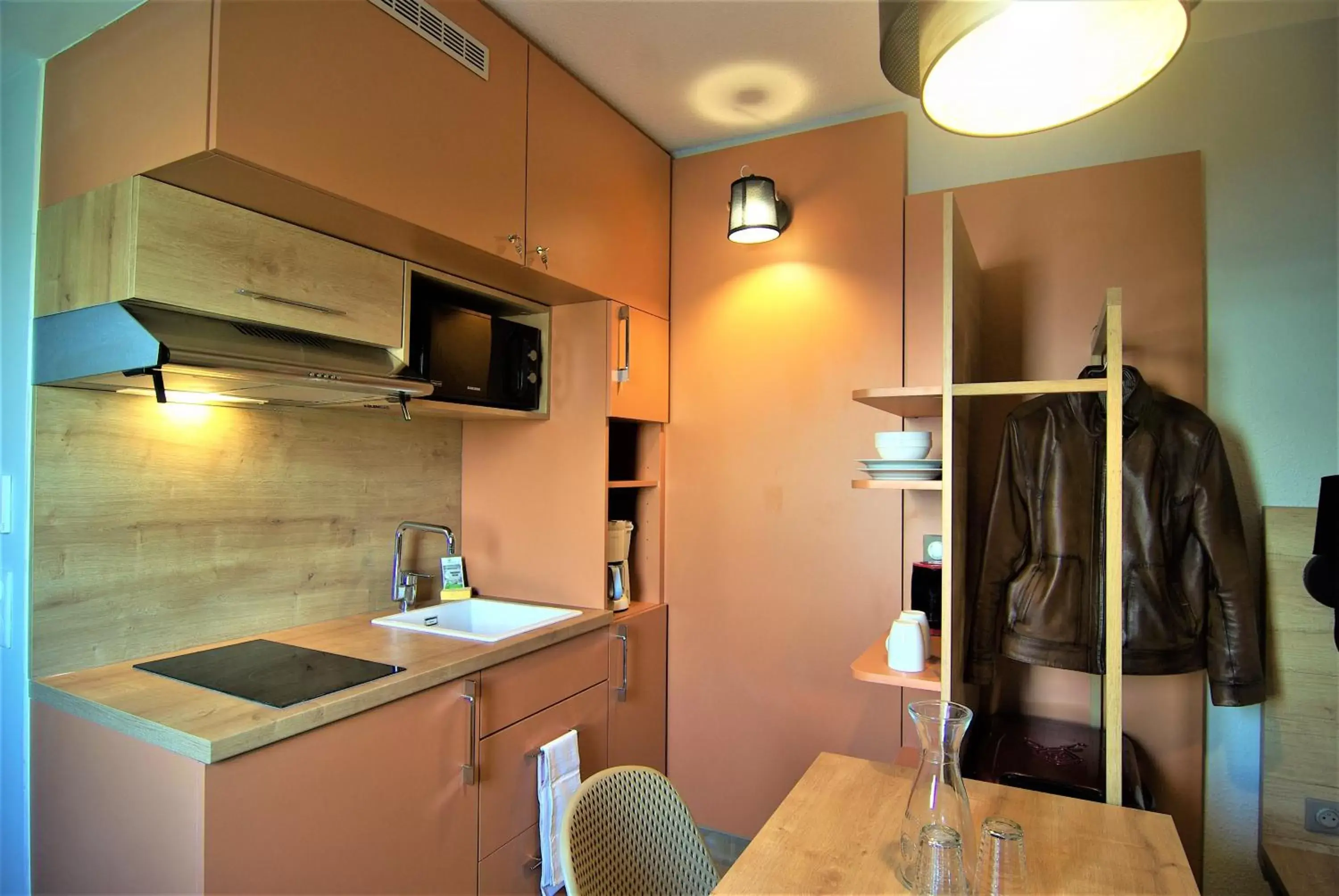 Kitchen/Kitchenette in Apparthotel Torcy