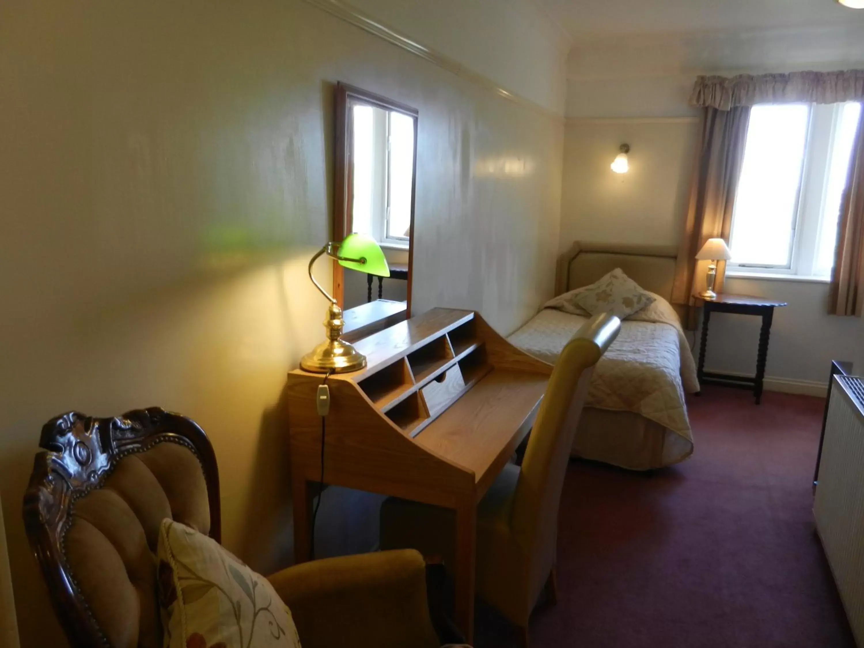 Photo of the whole room, Seating Area in Schoolhouse Restaurant and Hotel