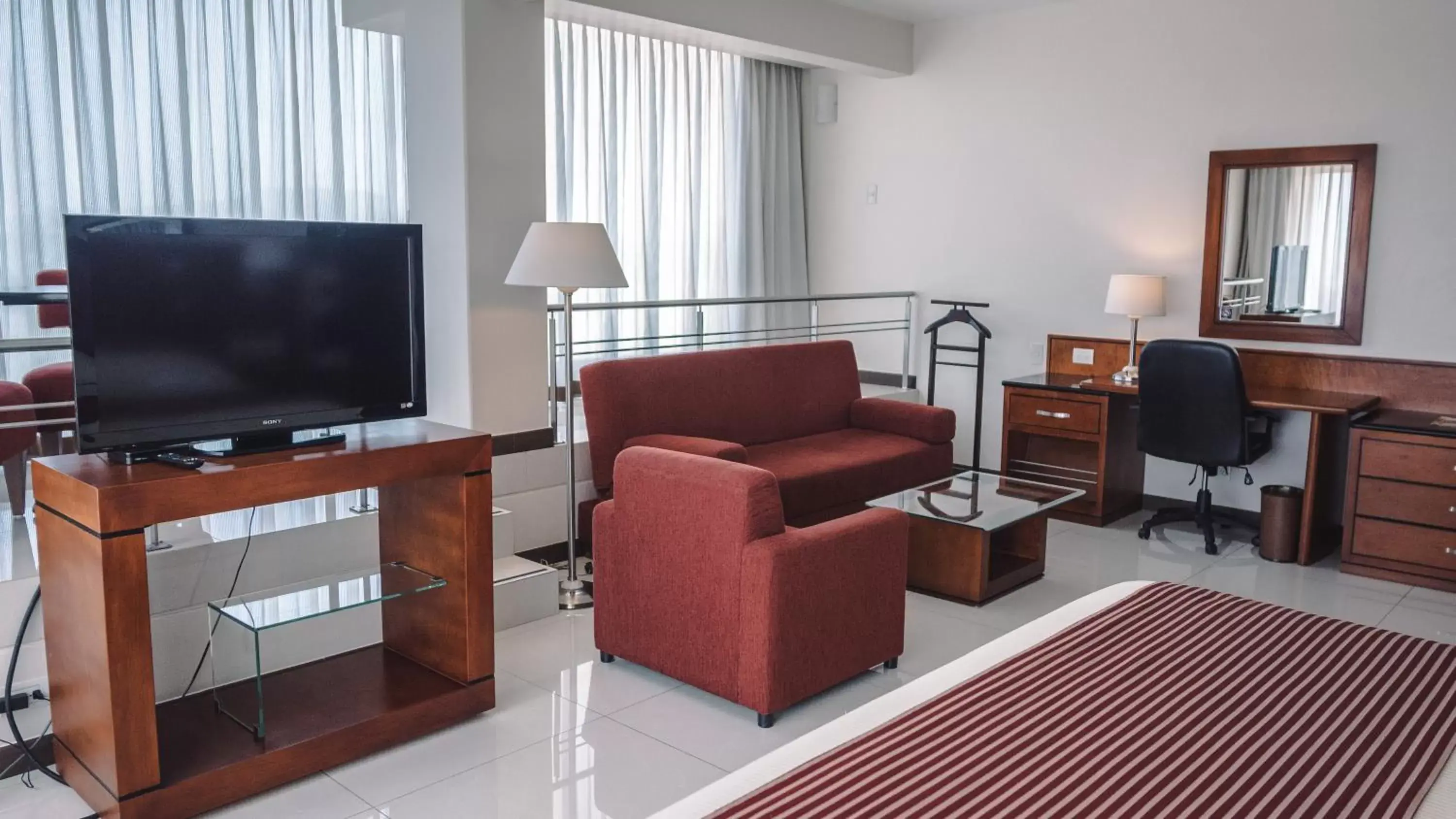 Property building, TV/Entertainment Center in Hotel Fortin Plaza