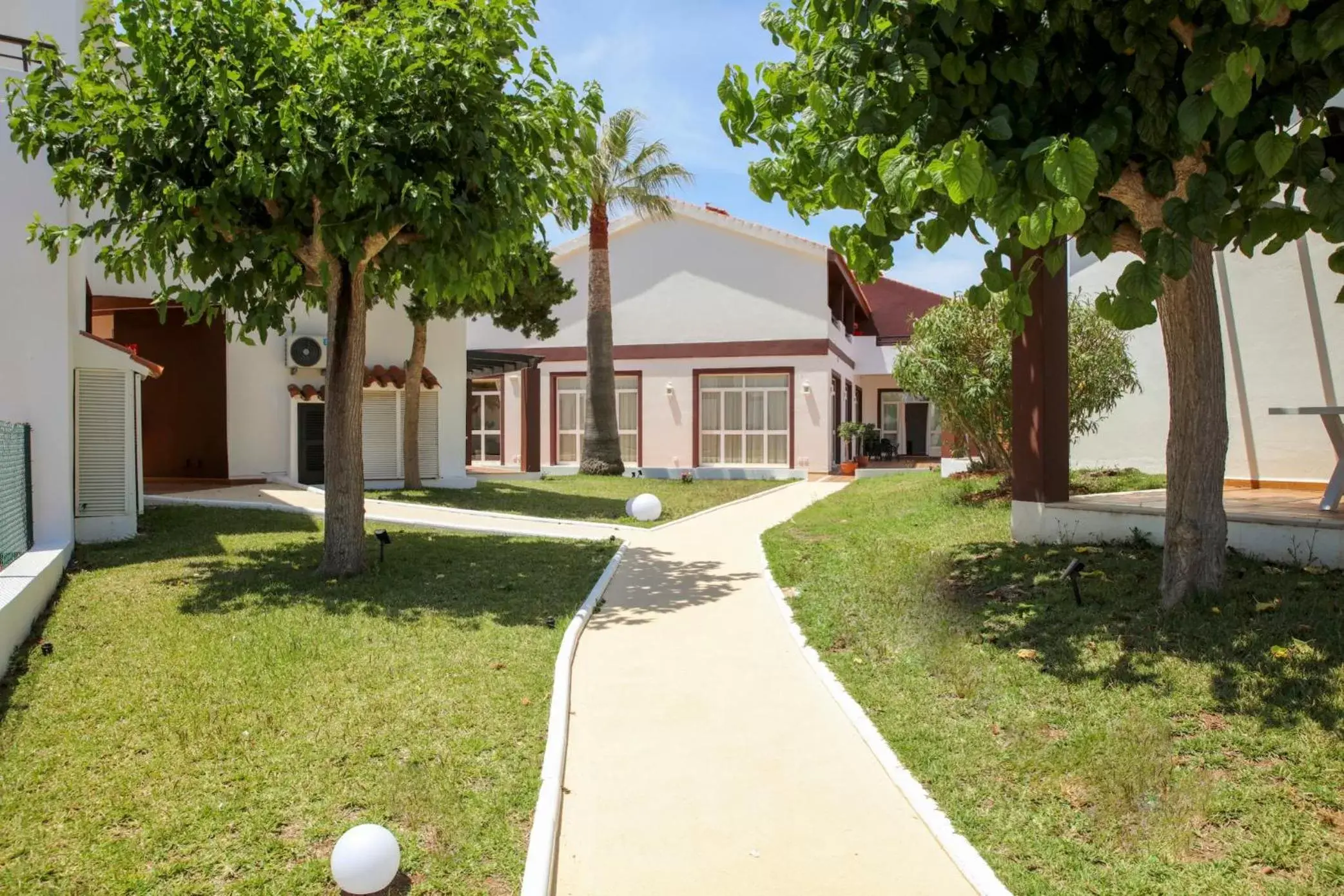 Garden, Property Building in Nuramar Resort & Villas