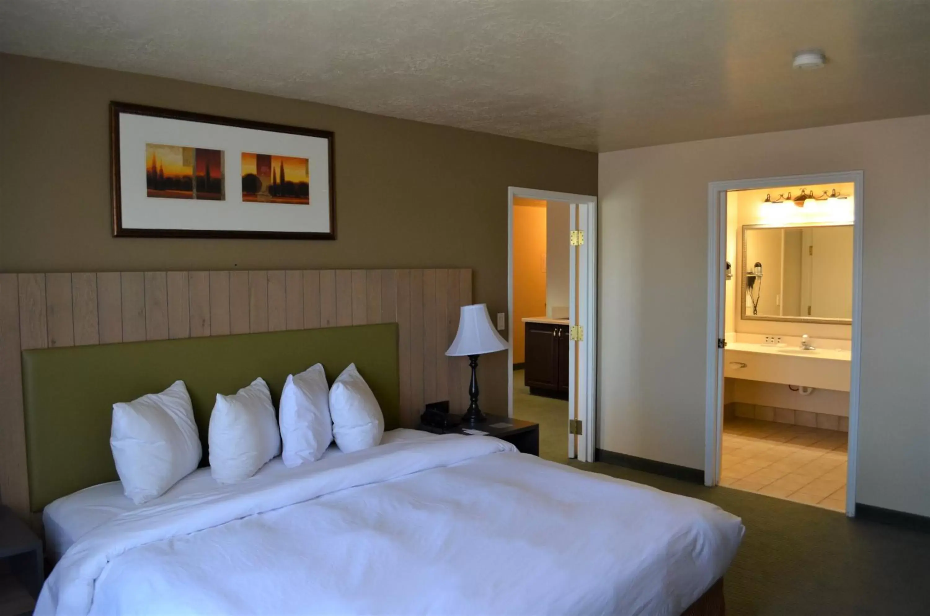 Bathroom, Bed in Country Inn & Suites by Radisson, West Valley City, UT