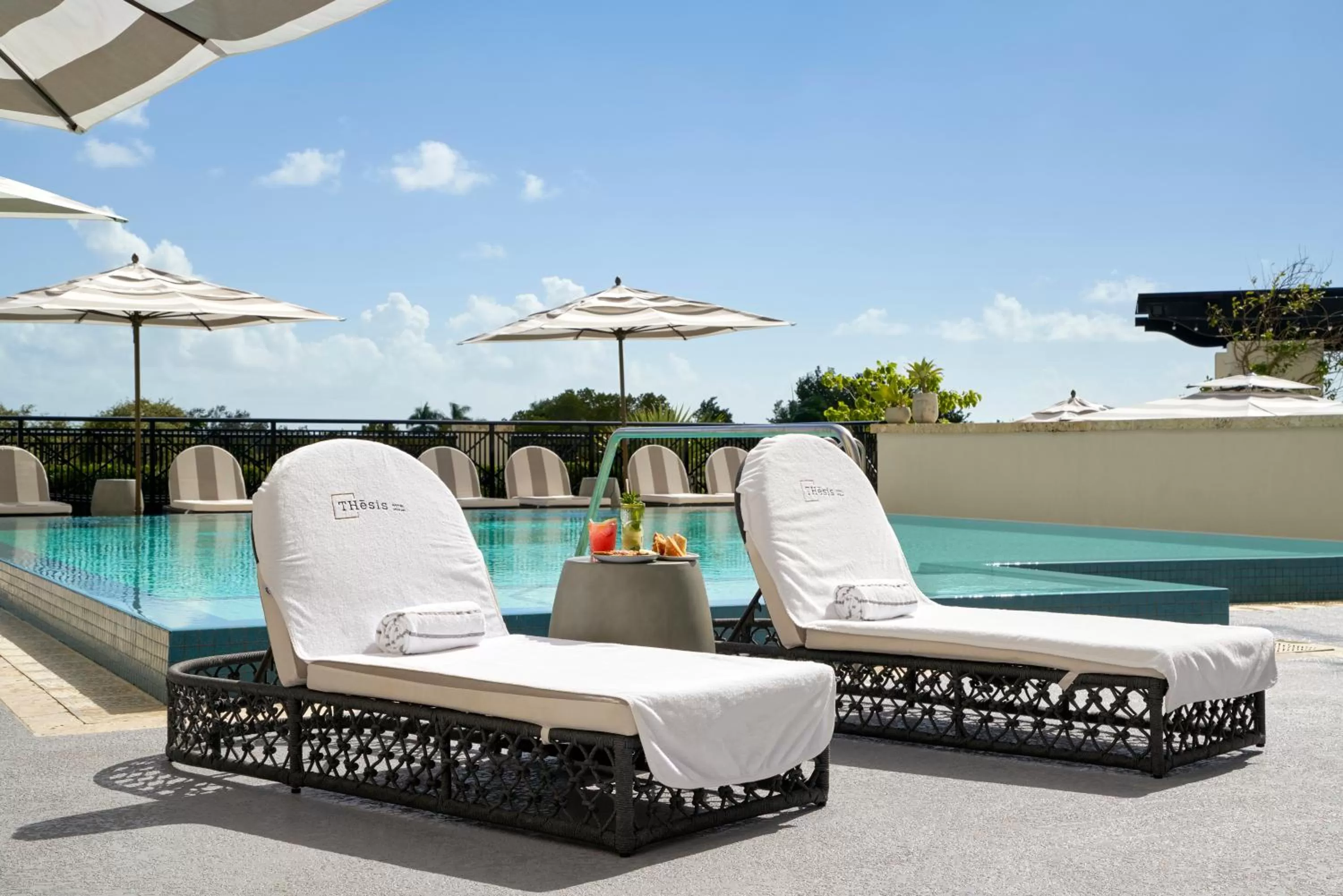 Swimming pool in THesis Hotel Miami Coral Gables, Curio Collection by Hilton