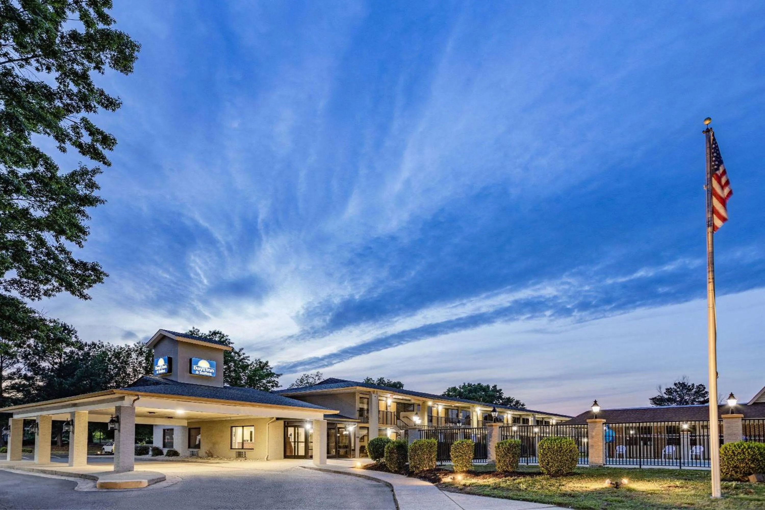 Property building in Days Inn & Suites by Wyndham Colonial