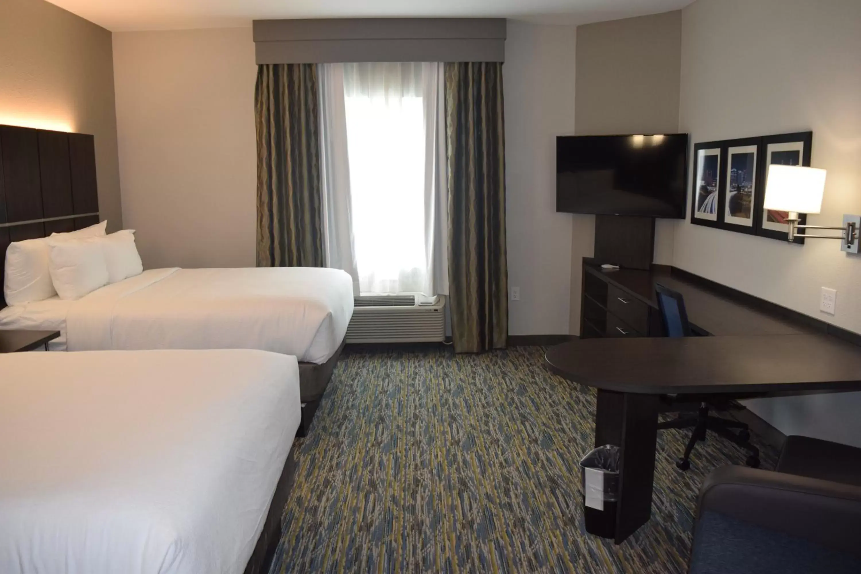 Photo of the whole room, TV/Entertainment Center in Candlewood Suites - Nashville Metro Center, an IHG Hotel