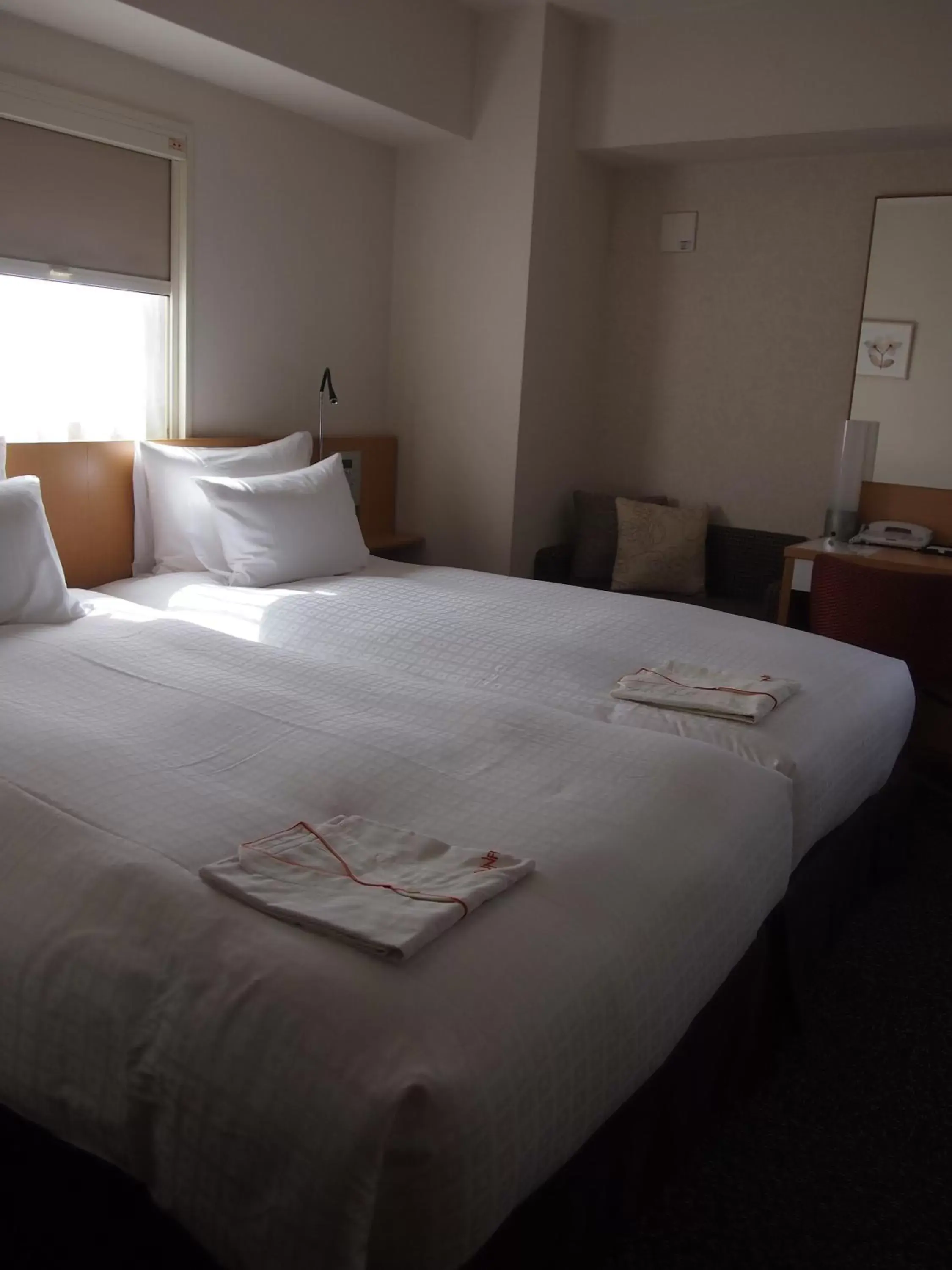 Bed in Hotel Sunflex Kagoshima