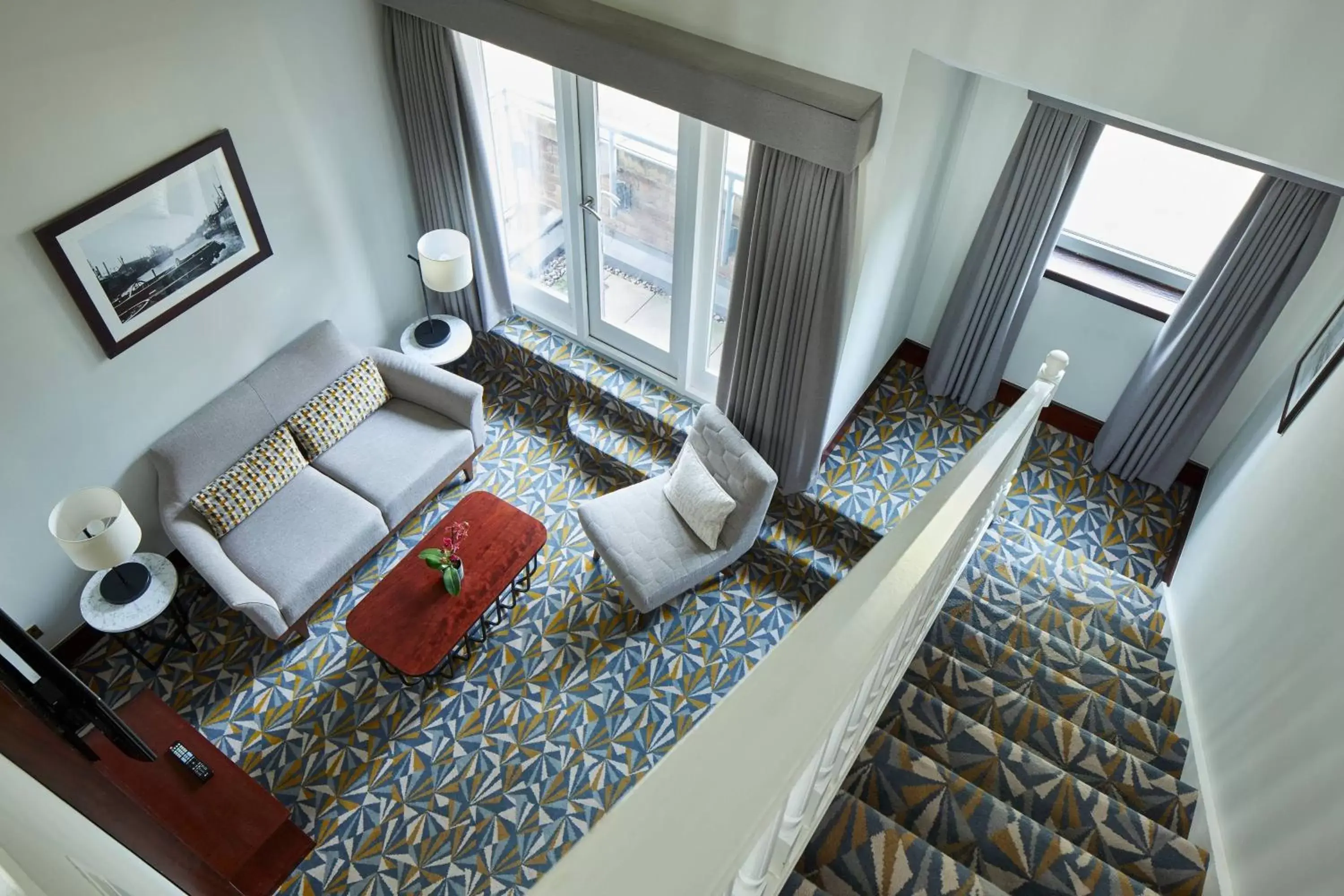 Photo of the whole room, Seating Area in Manchester Marriott Victoria & Albert Hotel