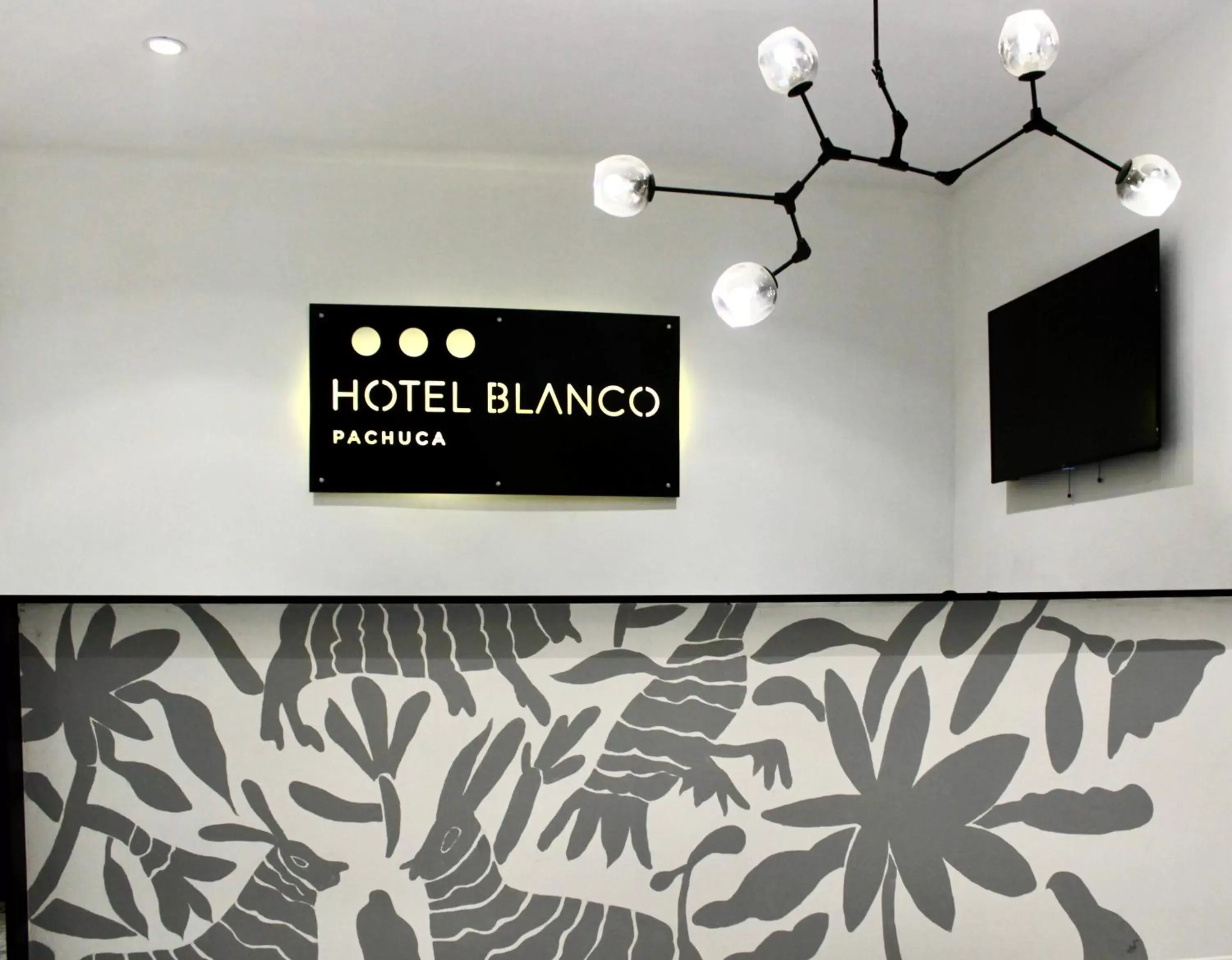 Lobby or reception in Hotel Blanco Pachuca