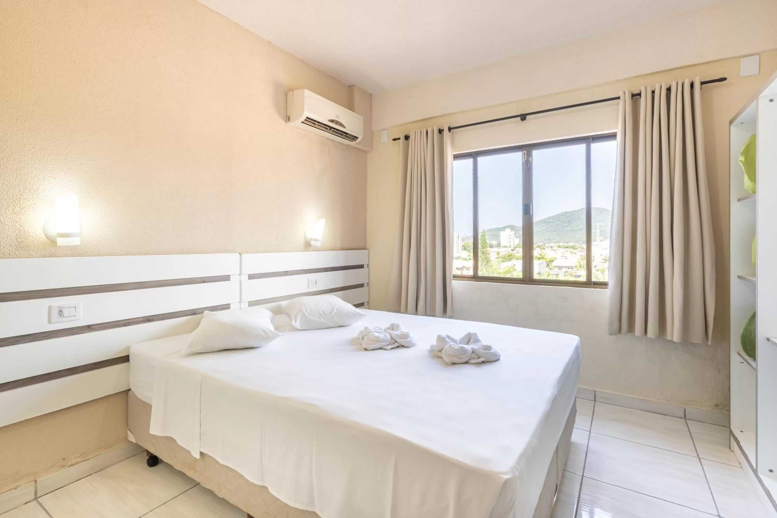 Bed in Hotel Conexão