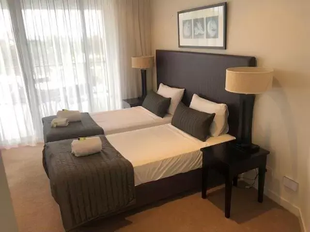 Bed in Grand Mercure Allegra Hervey Bay