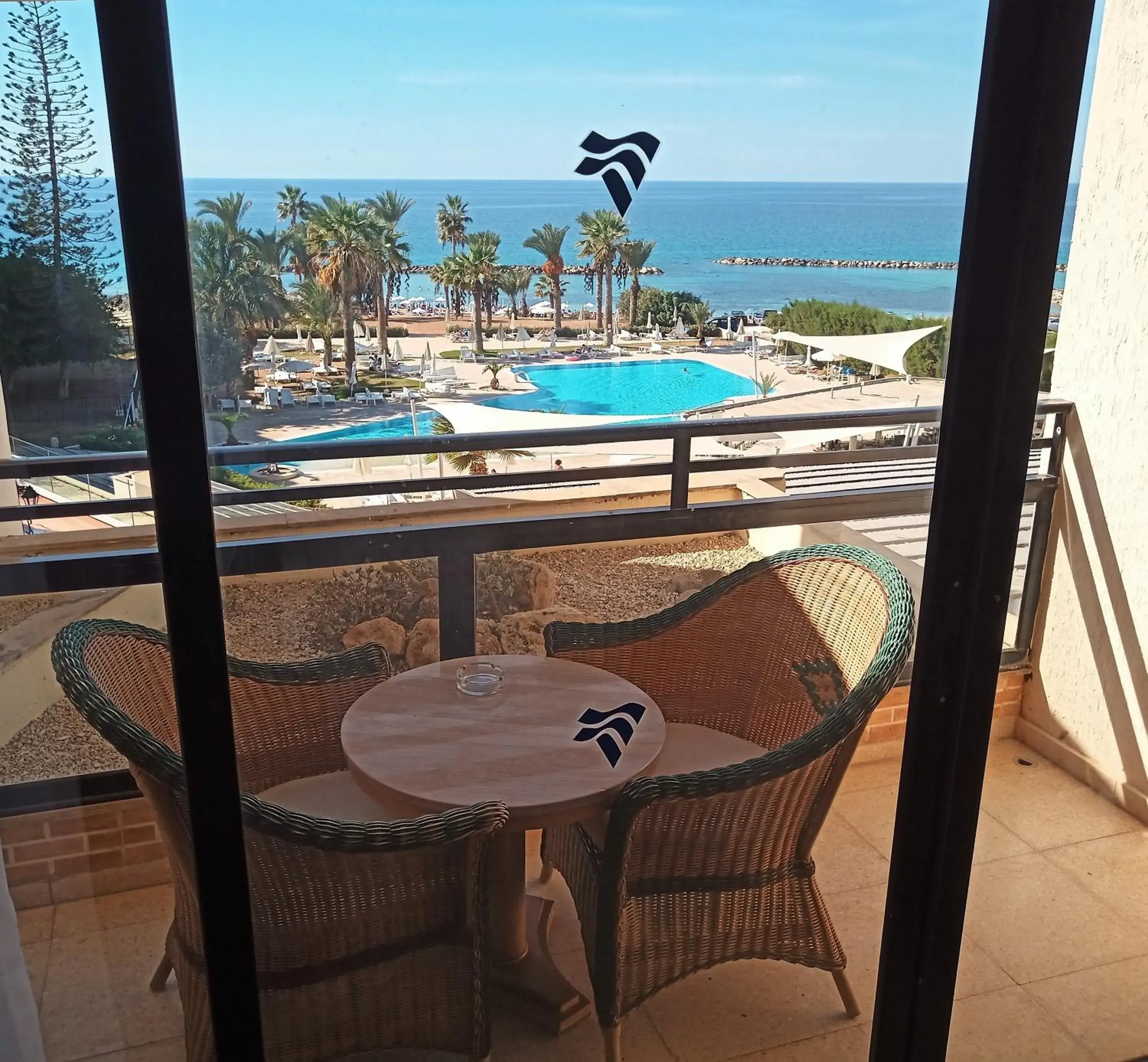 Balcony/Terrace, Pool View in Venus Beach Hotel