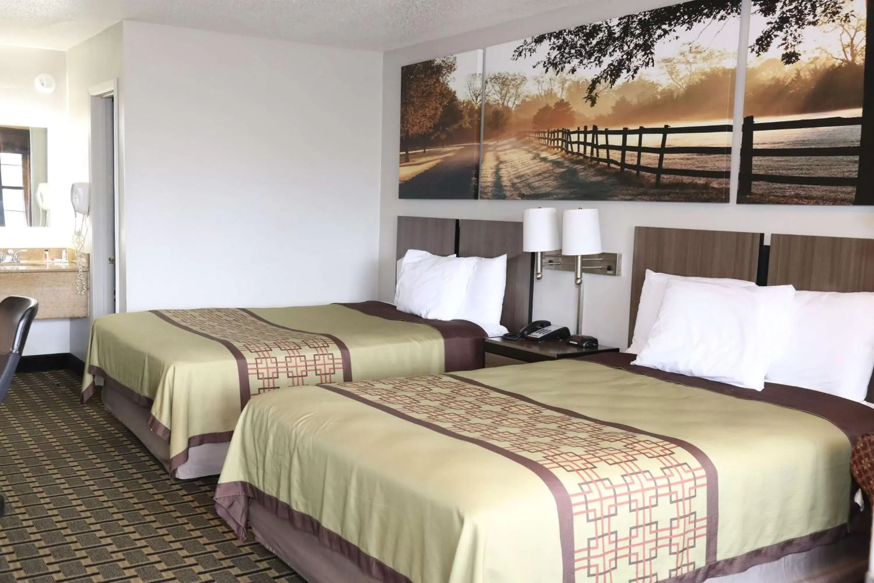 Photo of the whole room, Bed in Days Inn by Wyndham Monroe