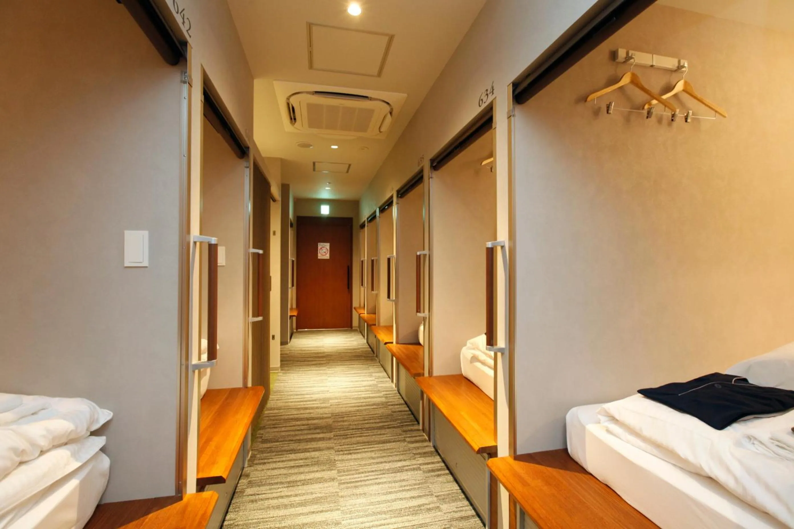 Bed in Gardens Cabin