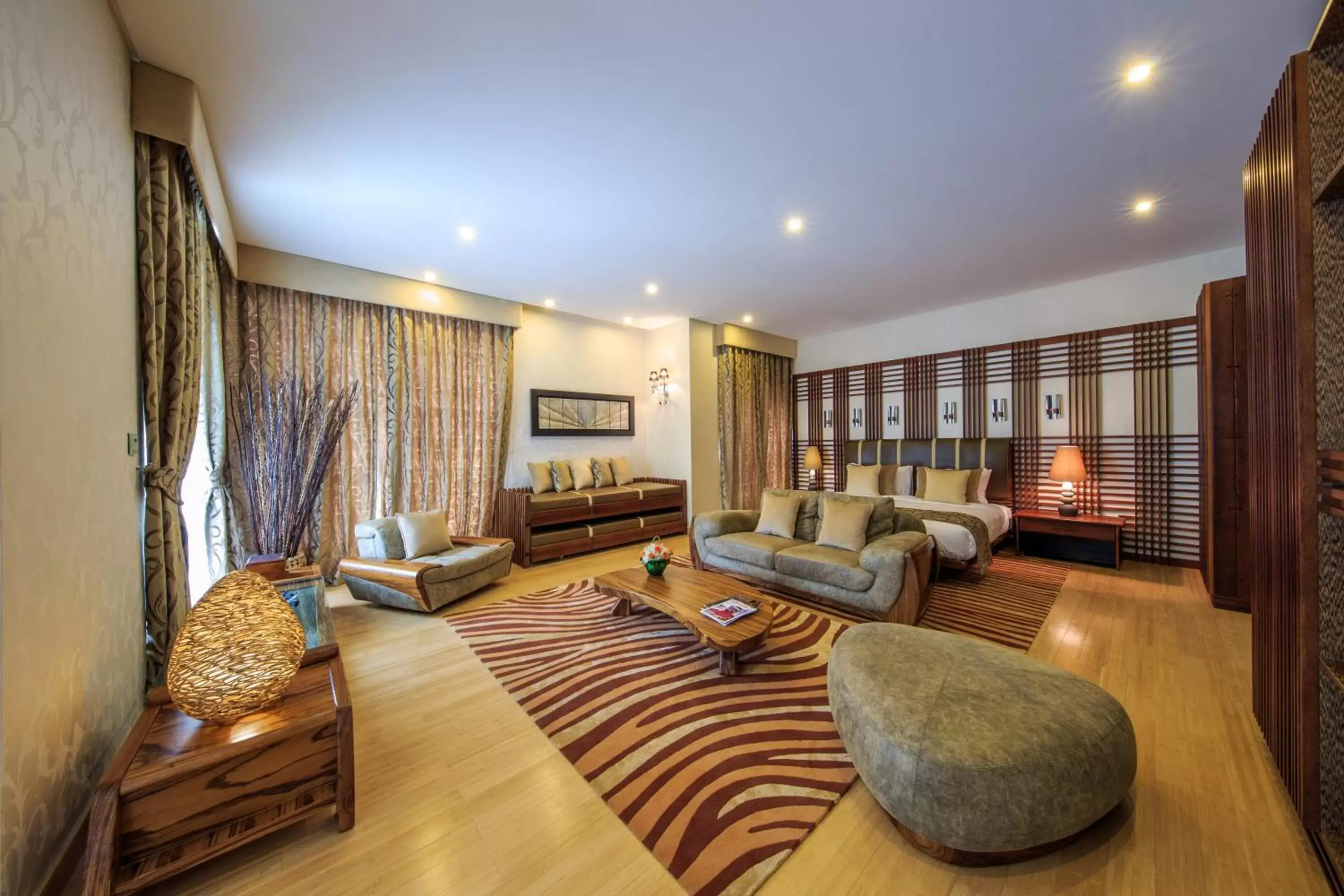 Bed, Seating Area in Reef Boutique Hotel