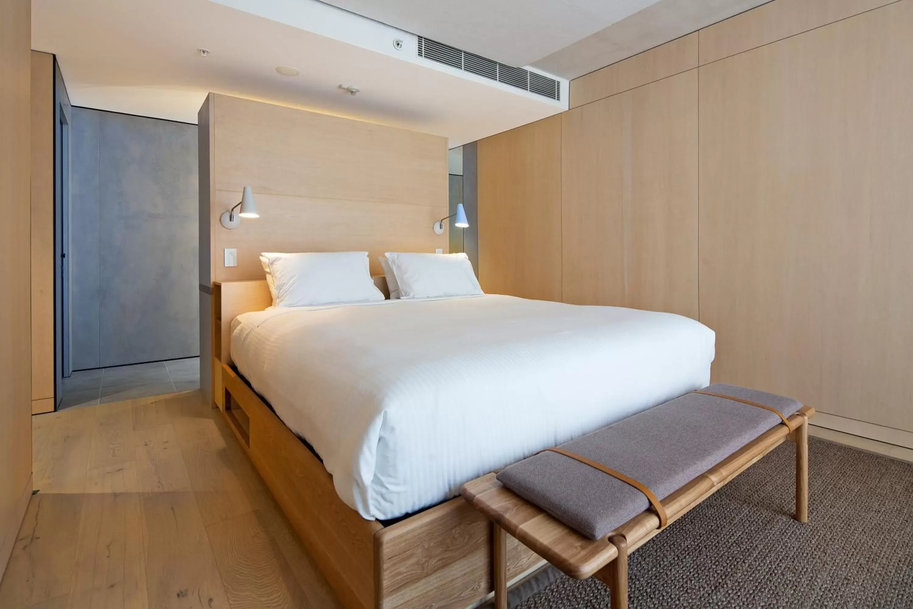 Bed in Zara Tower – Luxury Suites and Apartments