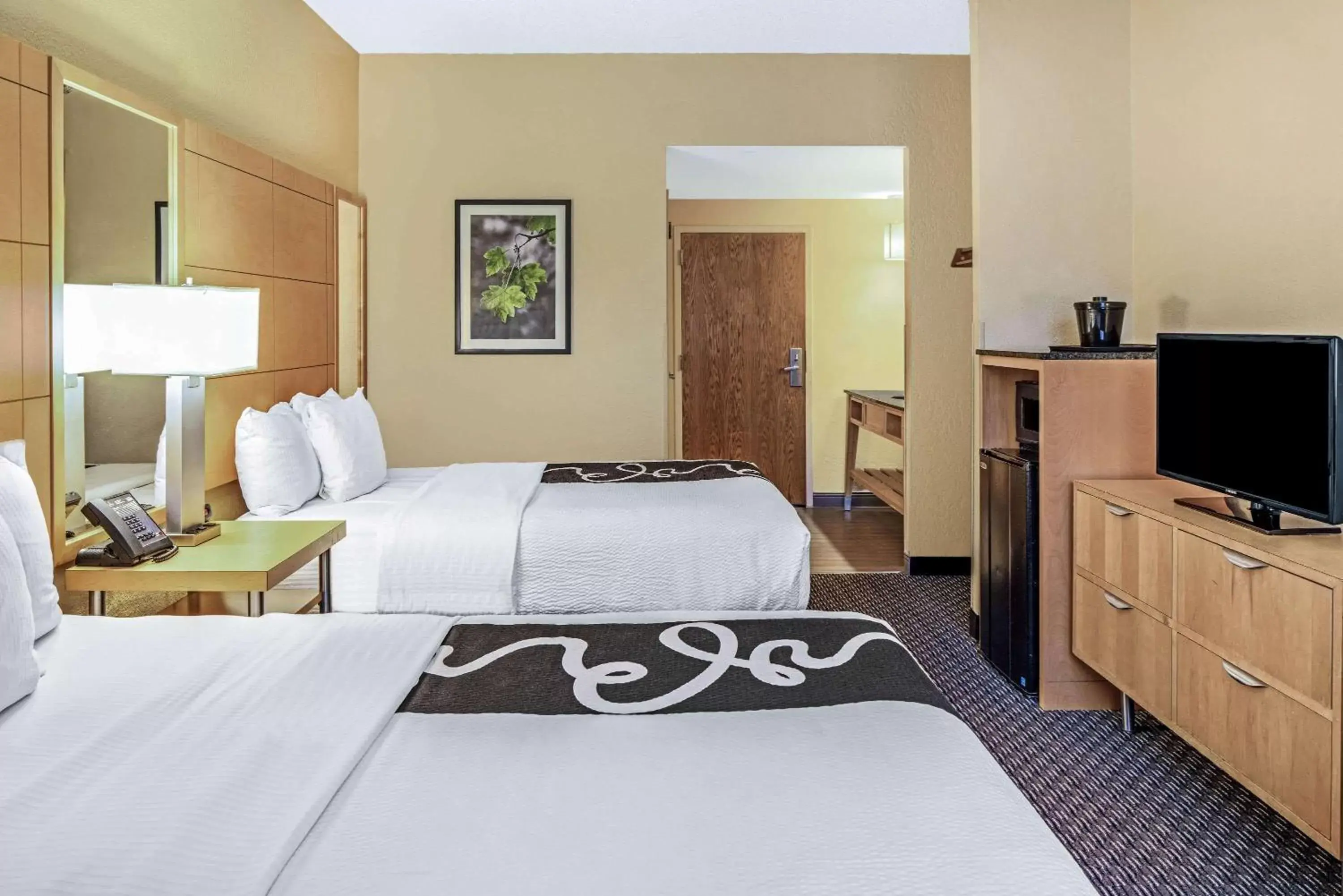 Photo of the whole room, Bed in La Quinta by Wyndham Naples Downtown Photo of the whole room, Bed in La Quinta by Wyndham Naples Downtown