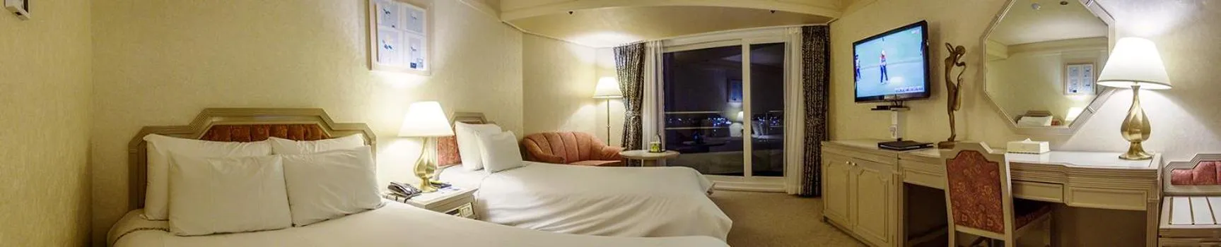 Bed in Jeju Pacific Hotel