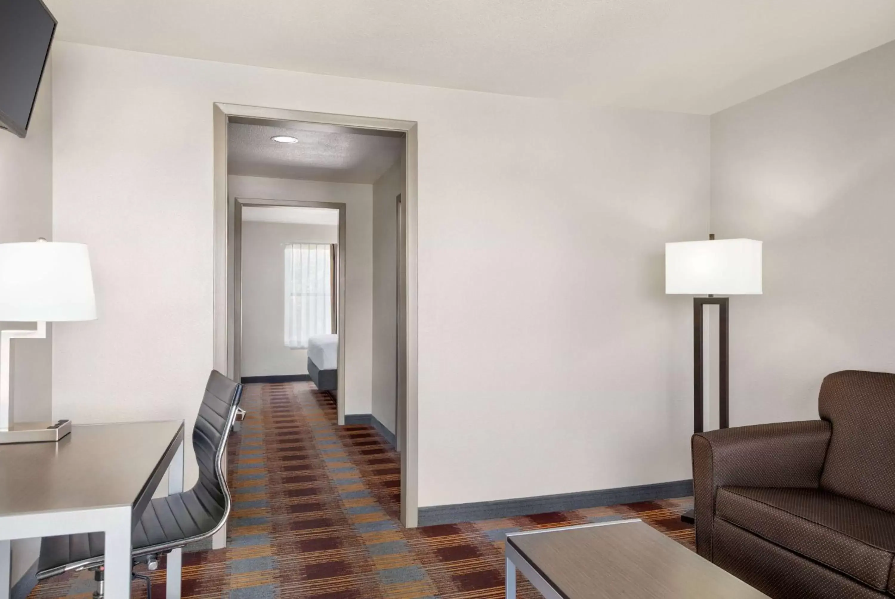 Bed, Seating Area in Days Inn by Wyndham San Antonio Near Fiesta Park