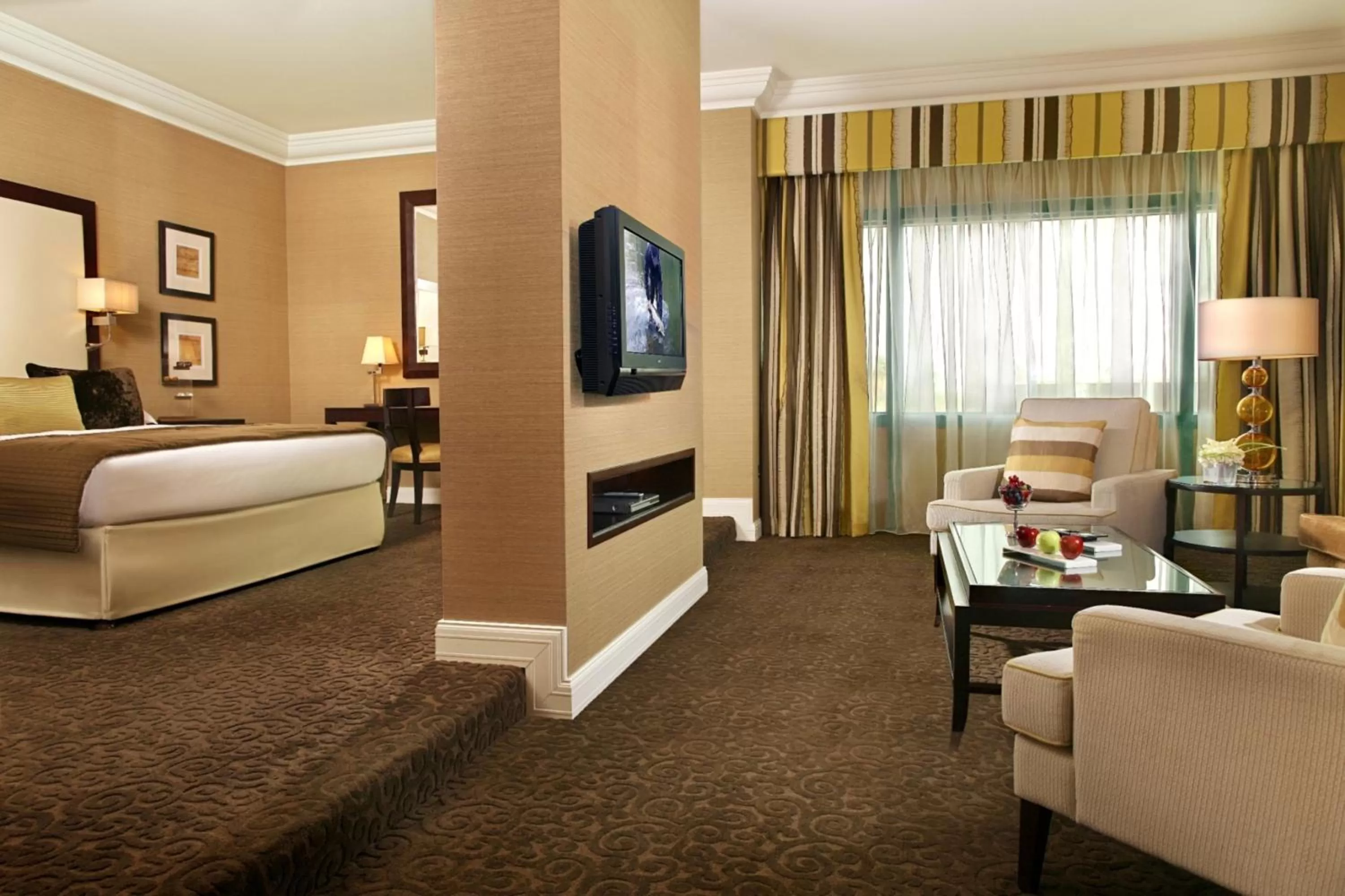 Photo of the whole room, Bed in Mövenpick Grand Al Bustan