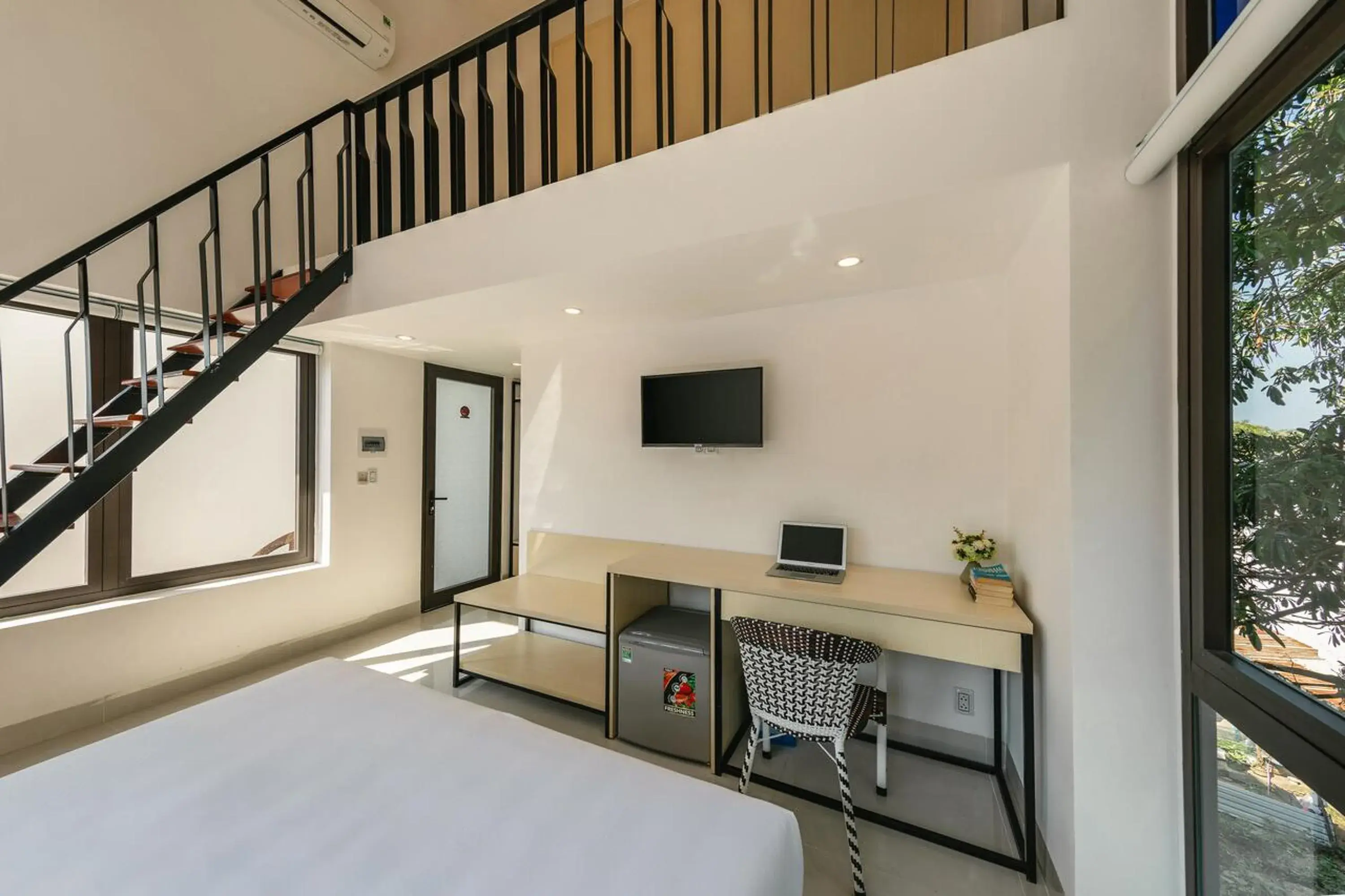 Bed, TV/Entertainment Center in Bespoke Villa Hoian